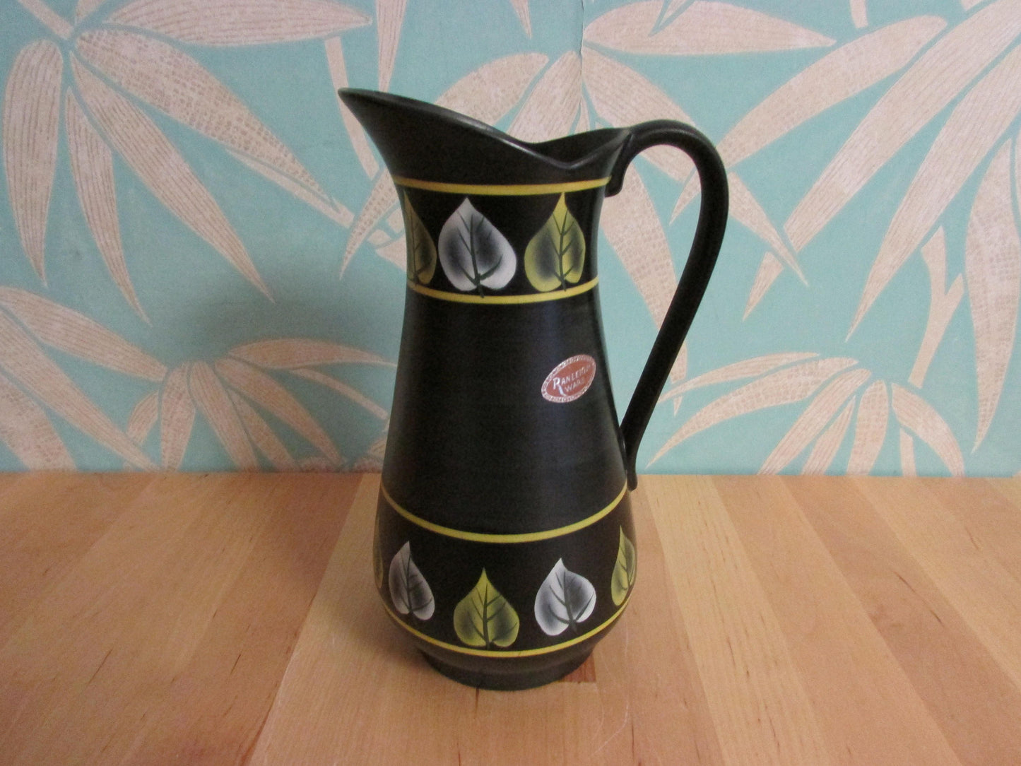 Vintage Ranleigh Ware Ercall black ceramic hand-painted pitcher/jug with contrast colour leaf print