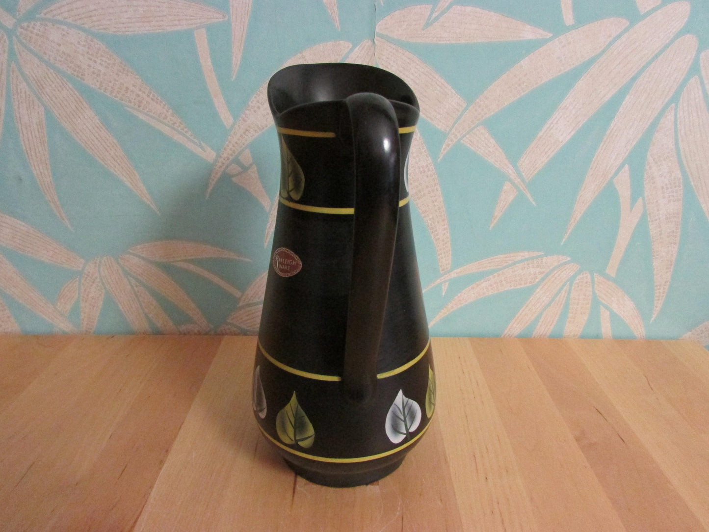 Vintage Ranleigh Ware Ercall black ceramic hand-painted pitcher/jug with contrast colour leaf print