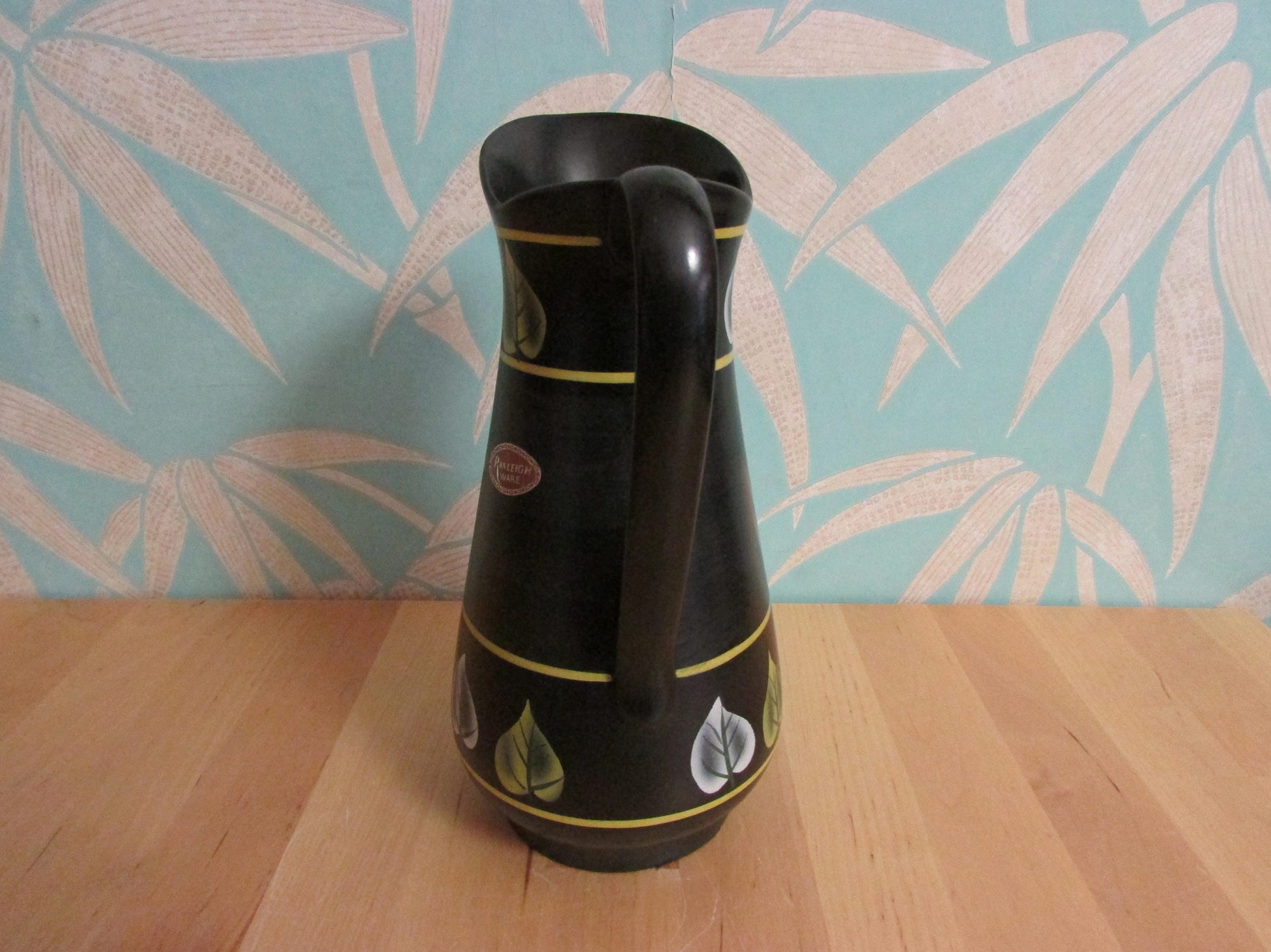Vintage Ranleigh Ware Ercall black ceramic hand-painted pitcher/jug with contrast colour leaf print