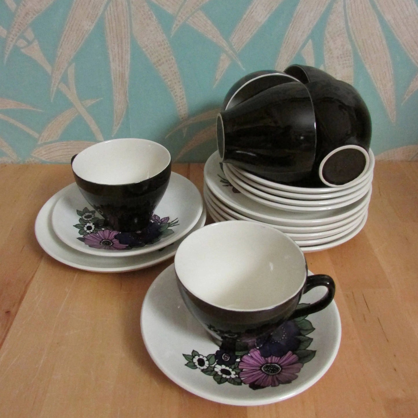 1960s/70s Cartwright & Edwards Ltd pink and purple floral patterned tea set, black cups