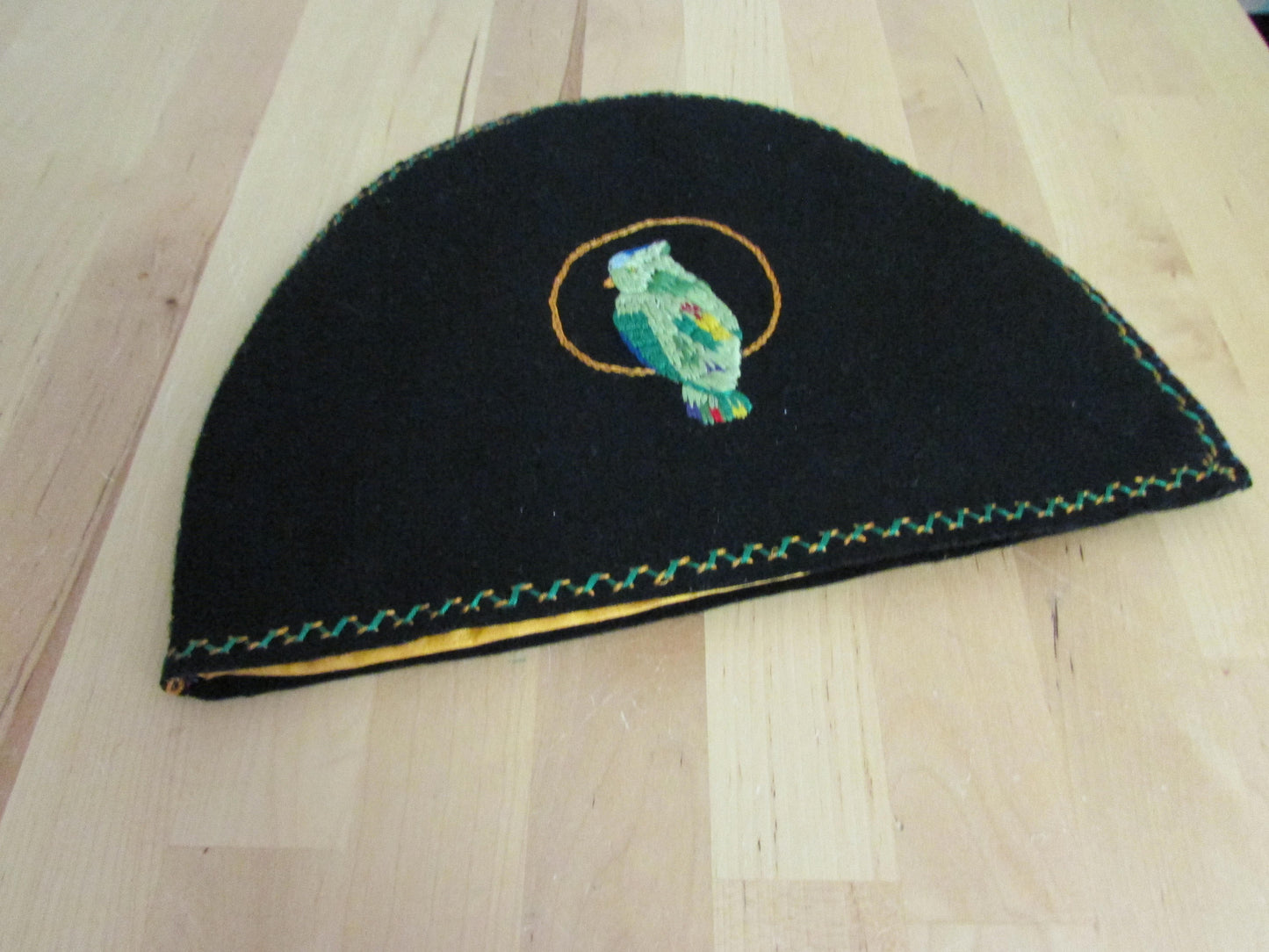 Vintage hand-made two-sided tea cosy with embroidered parrot, & floral edging detail