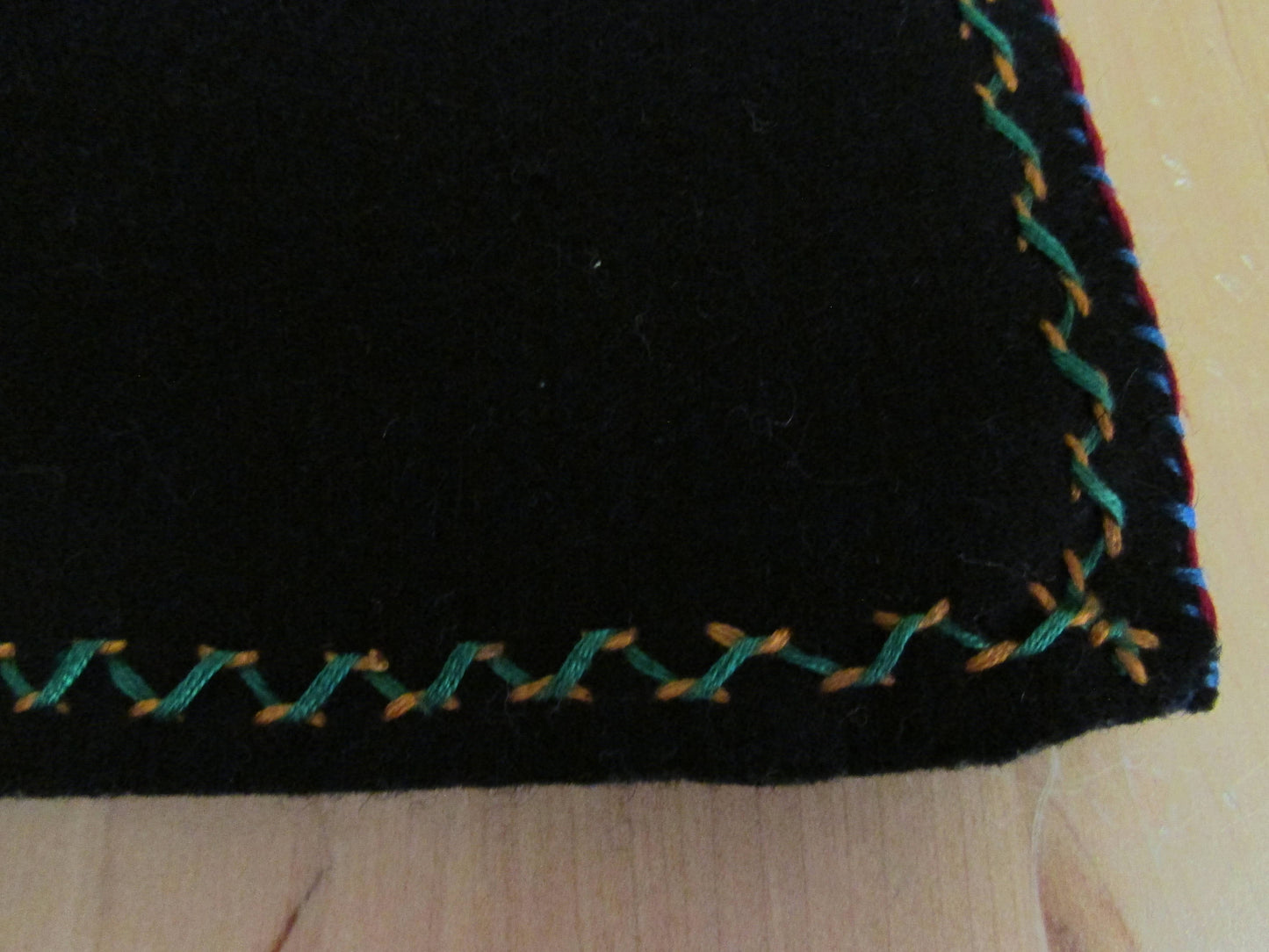 Vintage hand-made two-sided tea cosy with embroidered parrot, & floral edging detail