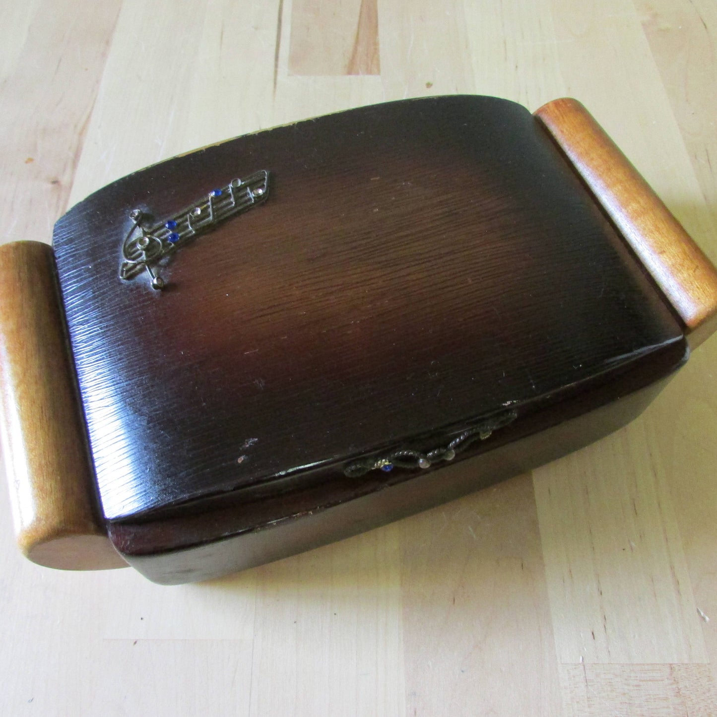 Vintage wooden jewellery/cigarette box, metal-tone music staff & notes highlighted with blue rhinestones