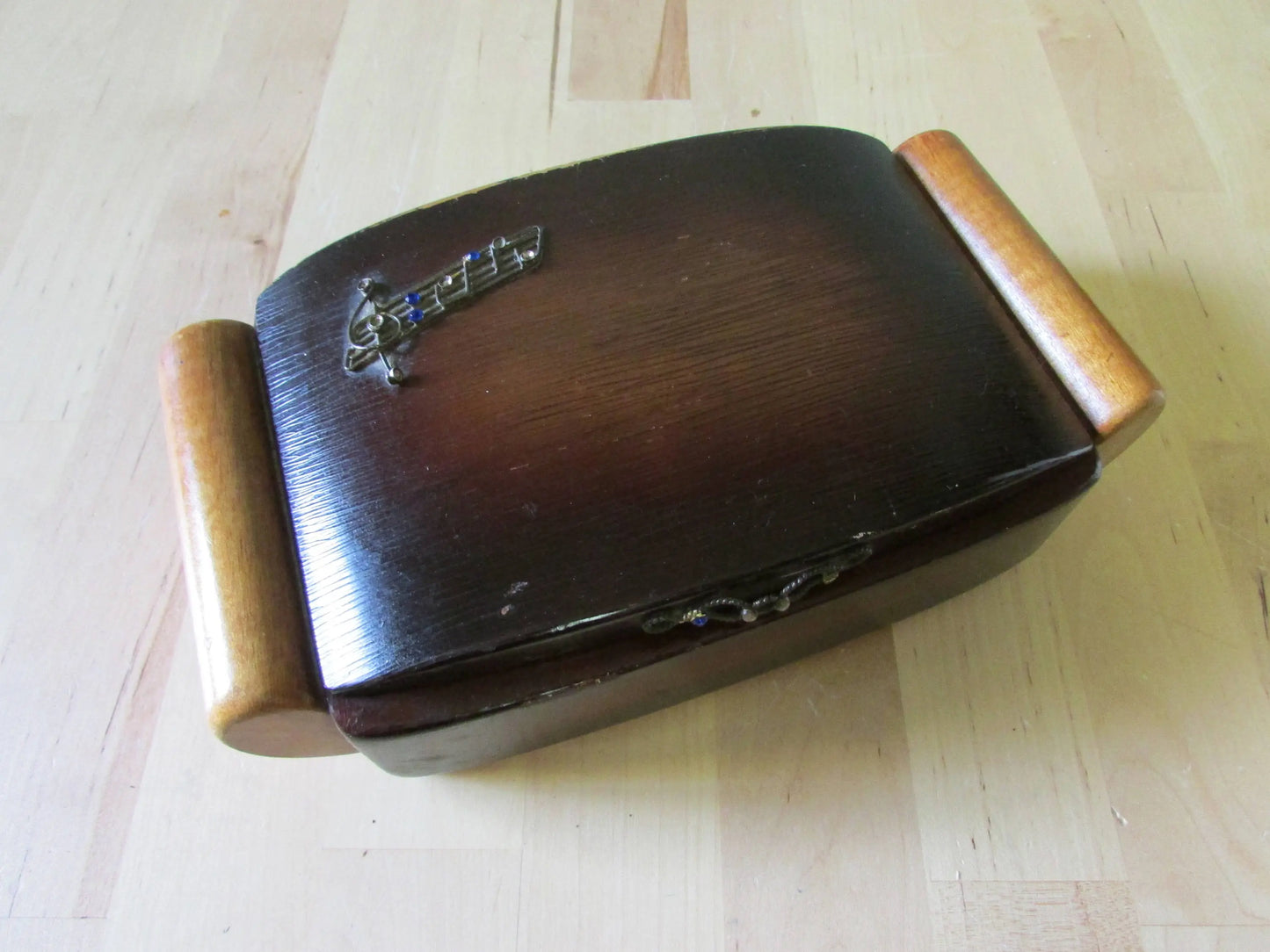 Vintage wooden jewellery/cigarette box, metal-tone music staff & notes highlighted with blue rhinestones