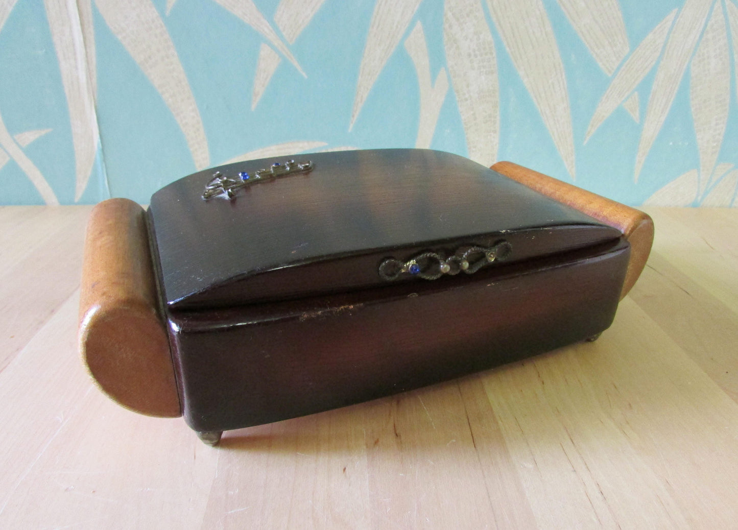 Vintage wooden jewellery/cigarette box, metal-tone music staff & notes highlighted with blue rhinestones