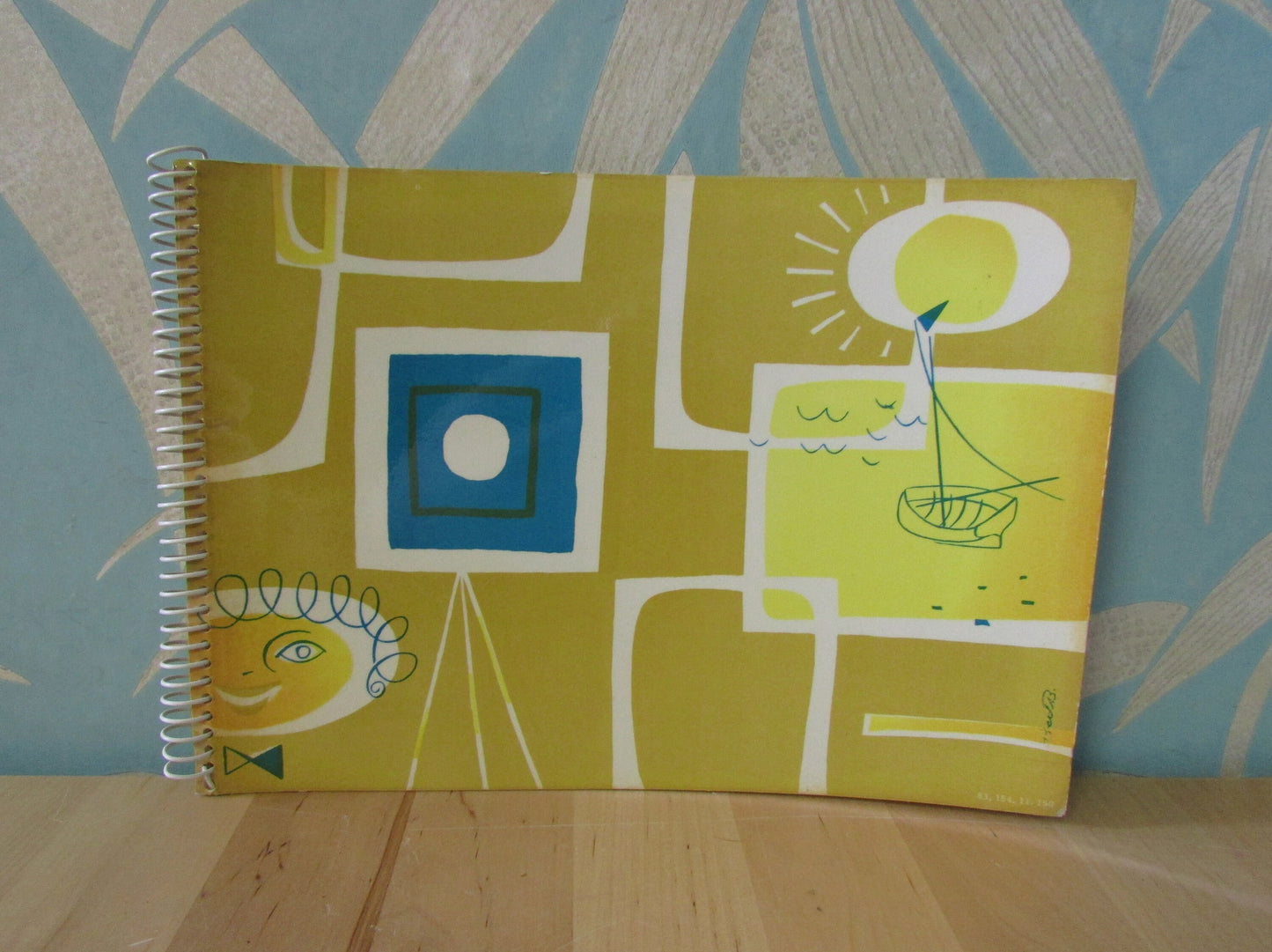 Mid-century photo album, abstract sun & boat motif cover, botanical patterned dividing sheets