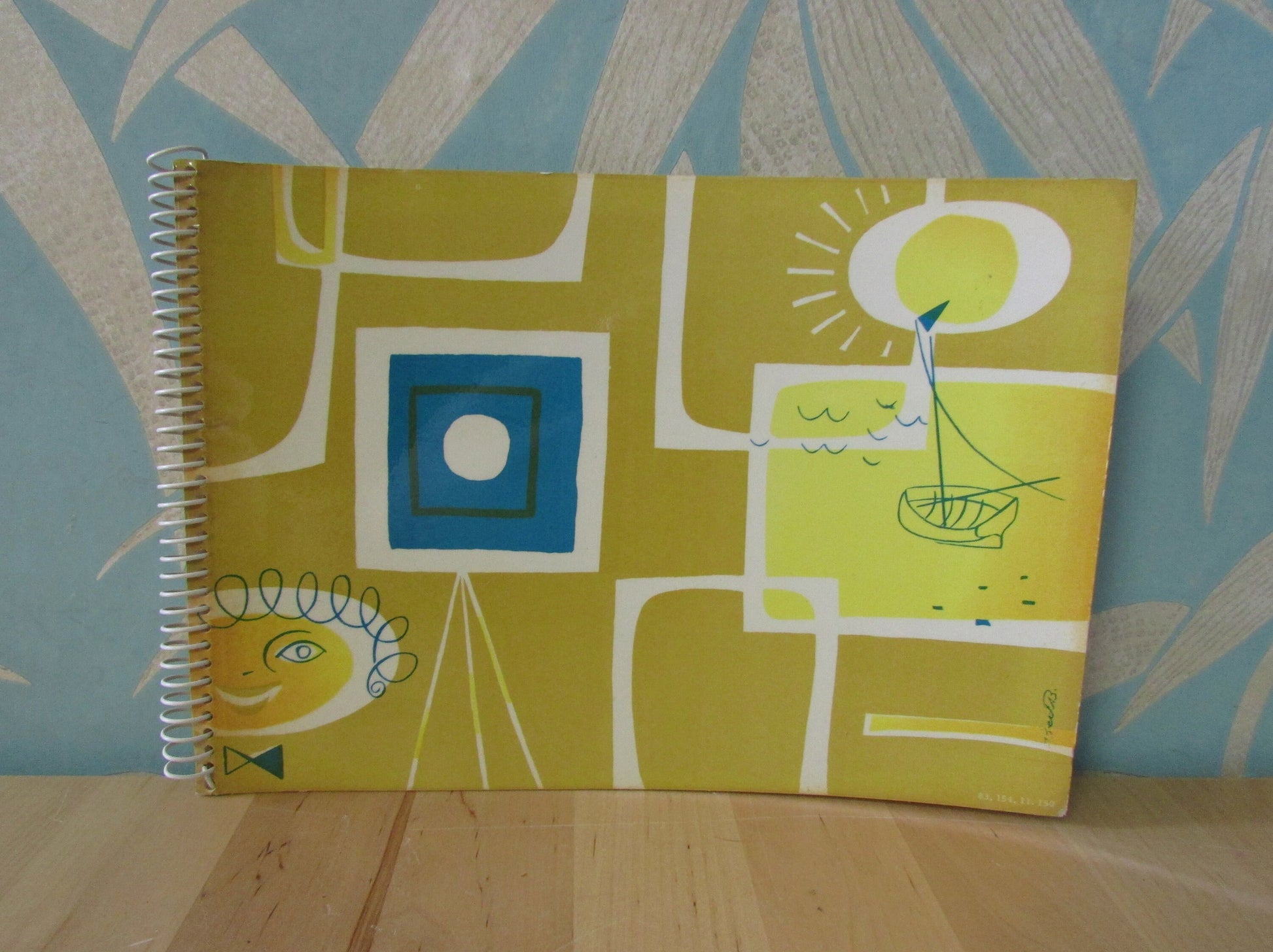 Mid-century photo album, abstract sun & boat motif cover, botanical patterned dividing sheets