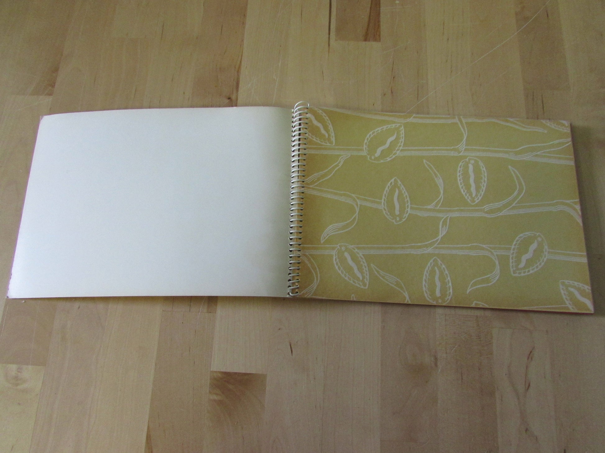 Mid-century photo album, abstract sun & boat motif cover, botanical patterned dividing sheets