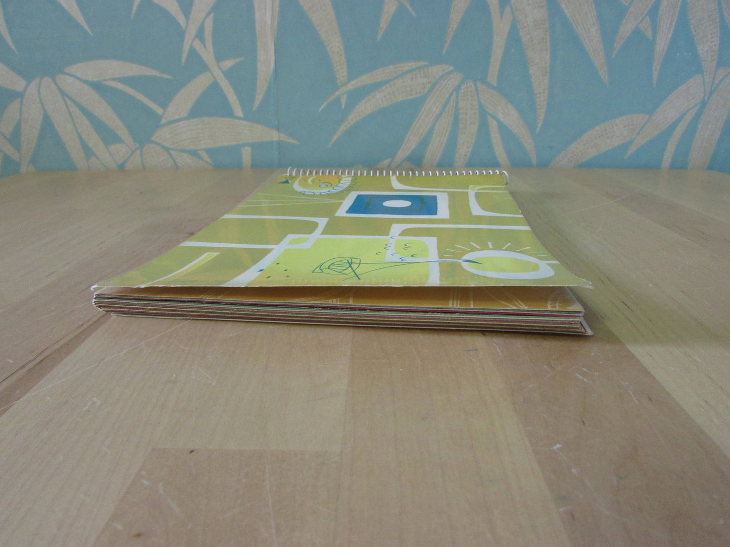 Mid-century photo album, abstract sun & boat motif cover, botanical patterned dividing sheets