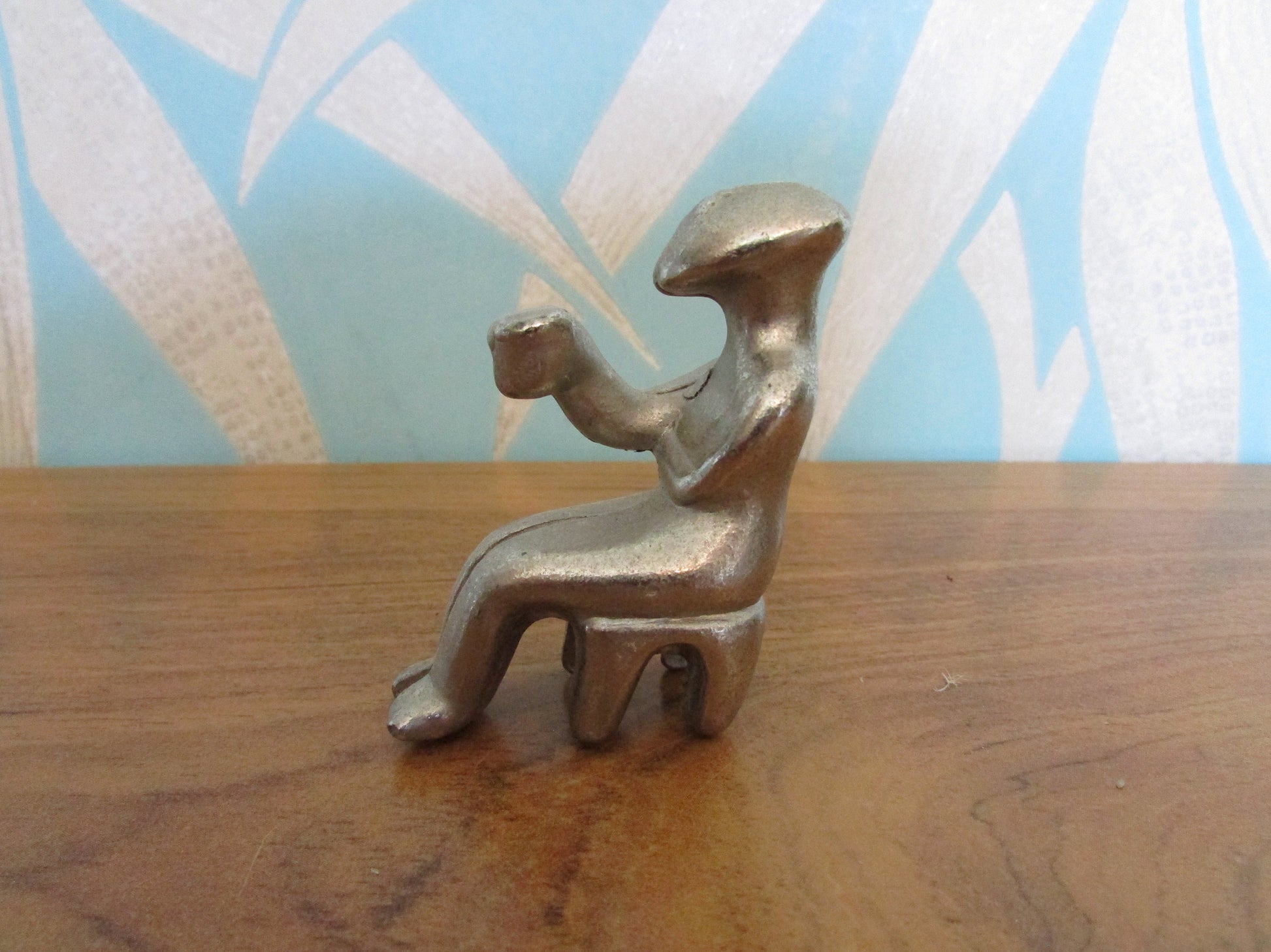 Rare silver-tone cast-metal miniature Cycladic "cup bearer" seated figurine
