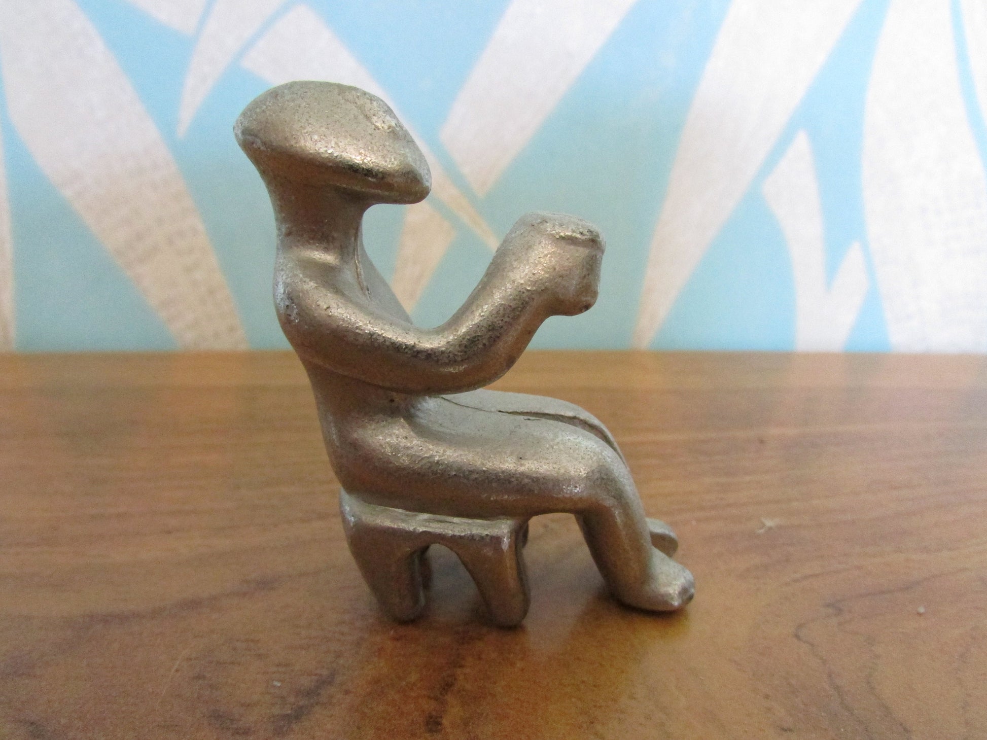 Rare silver-tone cast-metal miniature Cycladic "cup bearer" seated figurine