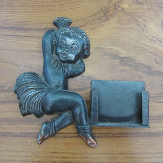 Unusual vintage Zero cast iron blackamoor infant vesta/match holder