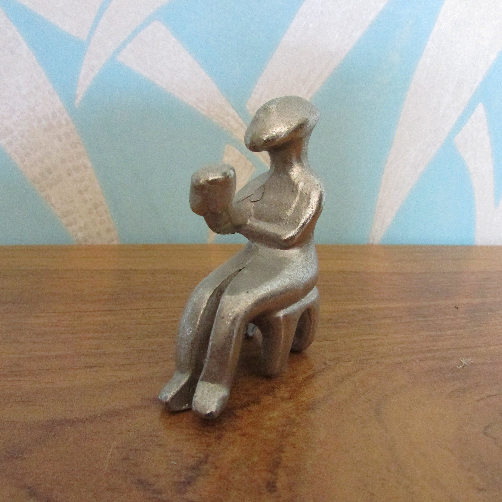 Rare silver-tone cast-metal miniature Cycladic "cup bearer" seated figurine