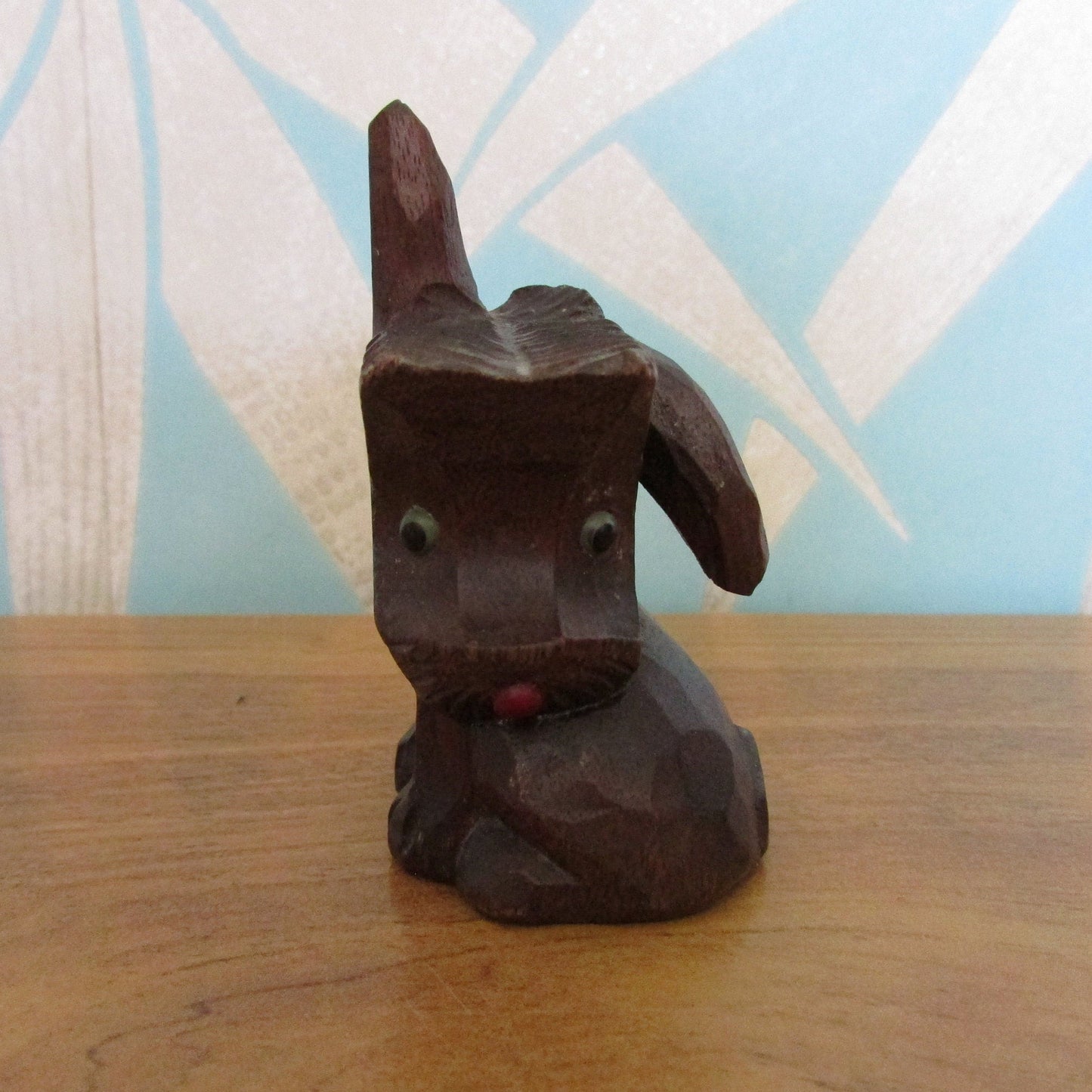 circa. 1930s carved wooden googly eye scotty dog figurine