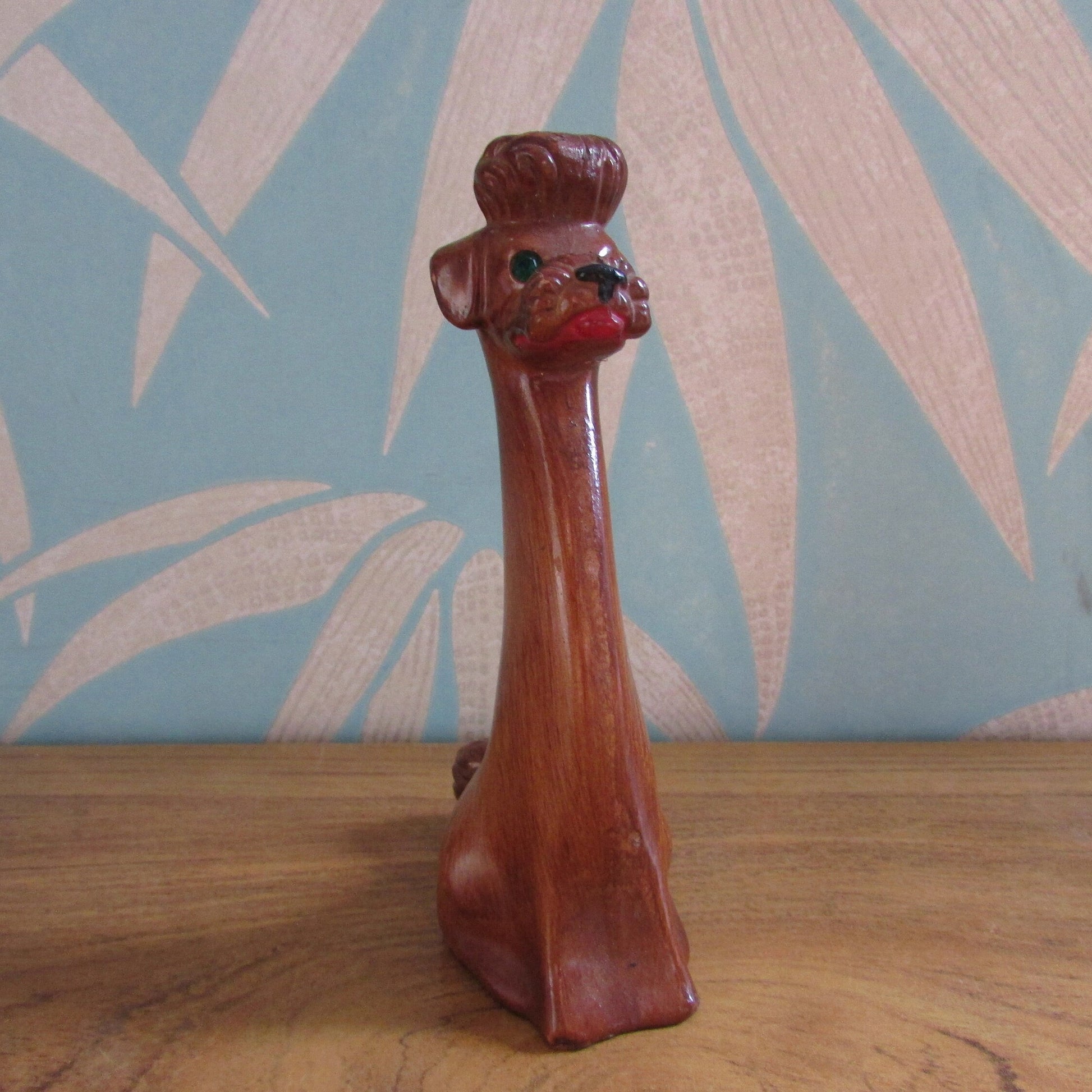 Vintage wood-effect poodle figurine with rhinestone eye detail, made in Italy