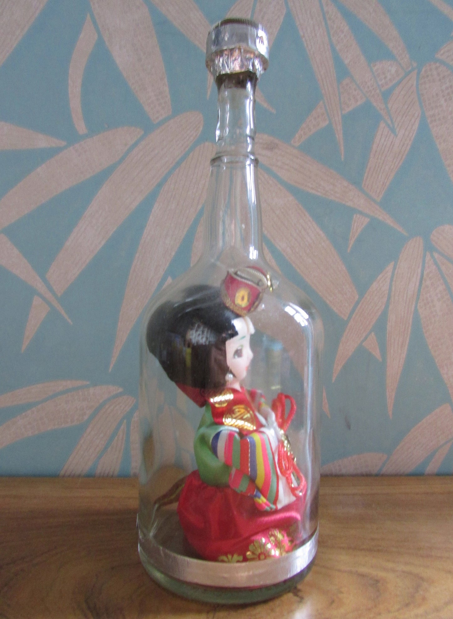 Quirky 'bottled' vintage Korean souvenir doll in traditional bridal dress