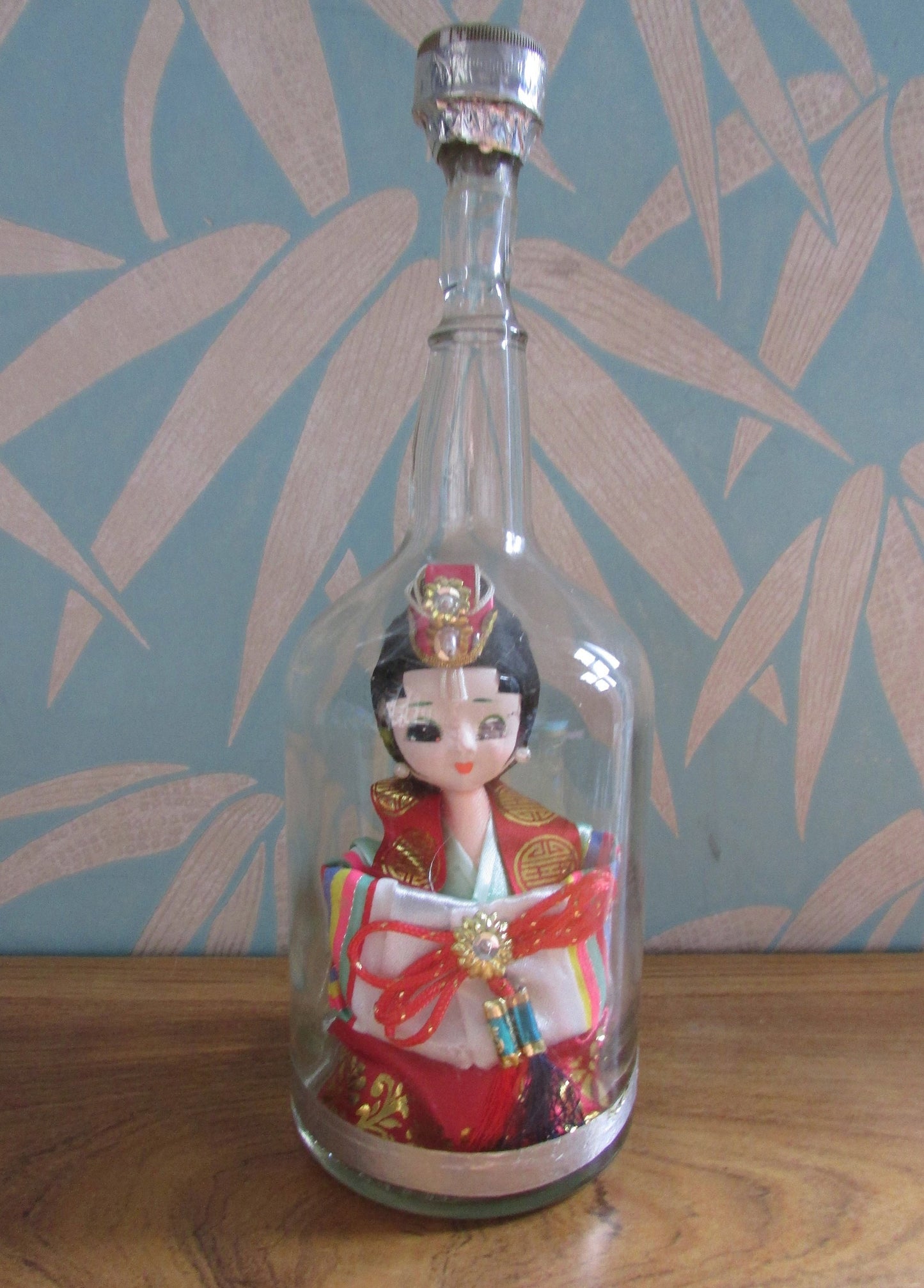 Quirky 'bottled' vintage Korean souvenir doll in traditional bridal dress
