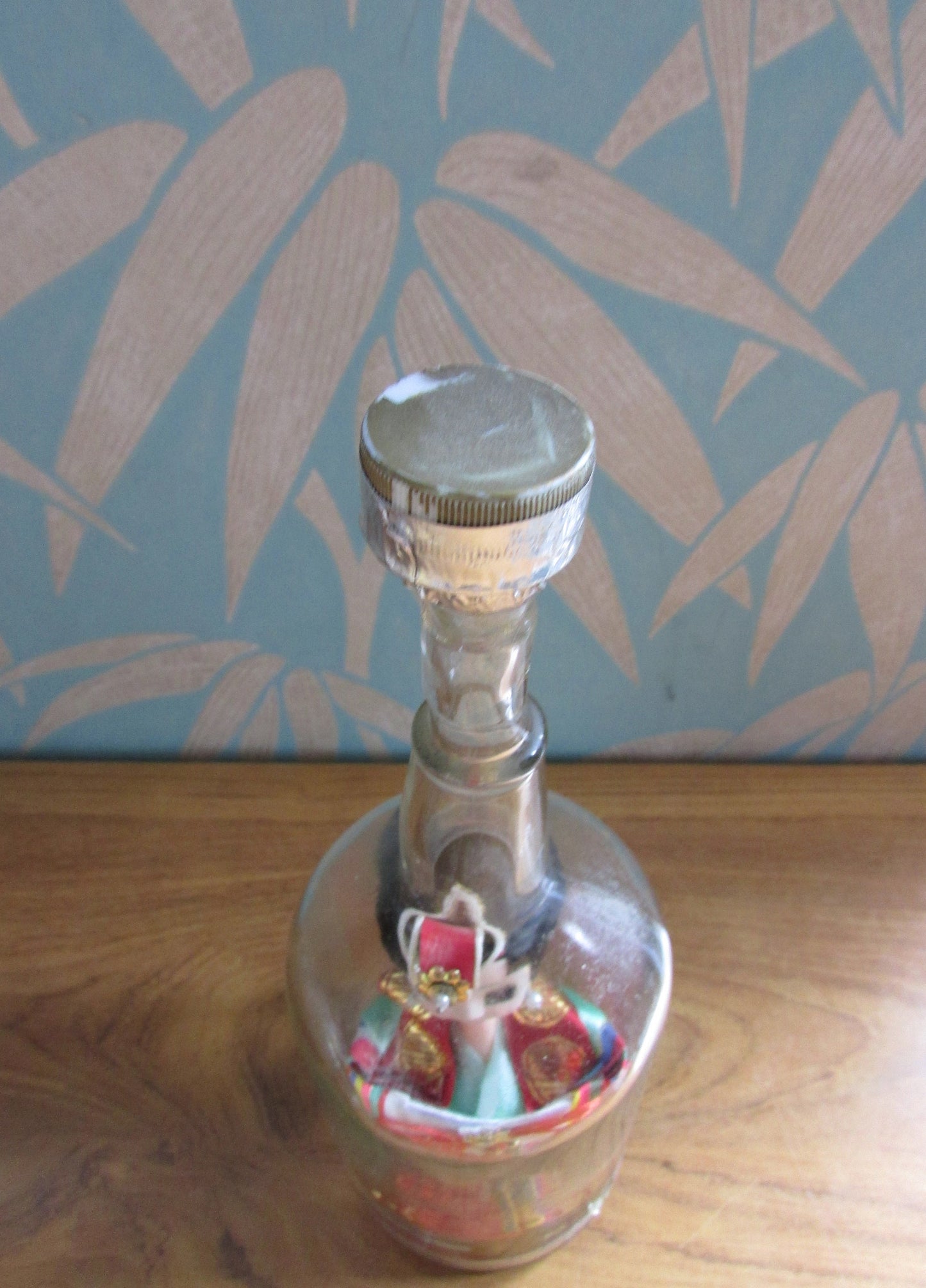 Quirky 'bottled' vintage Korean souvenir doll in traditional bridal dress