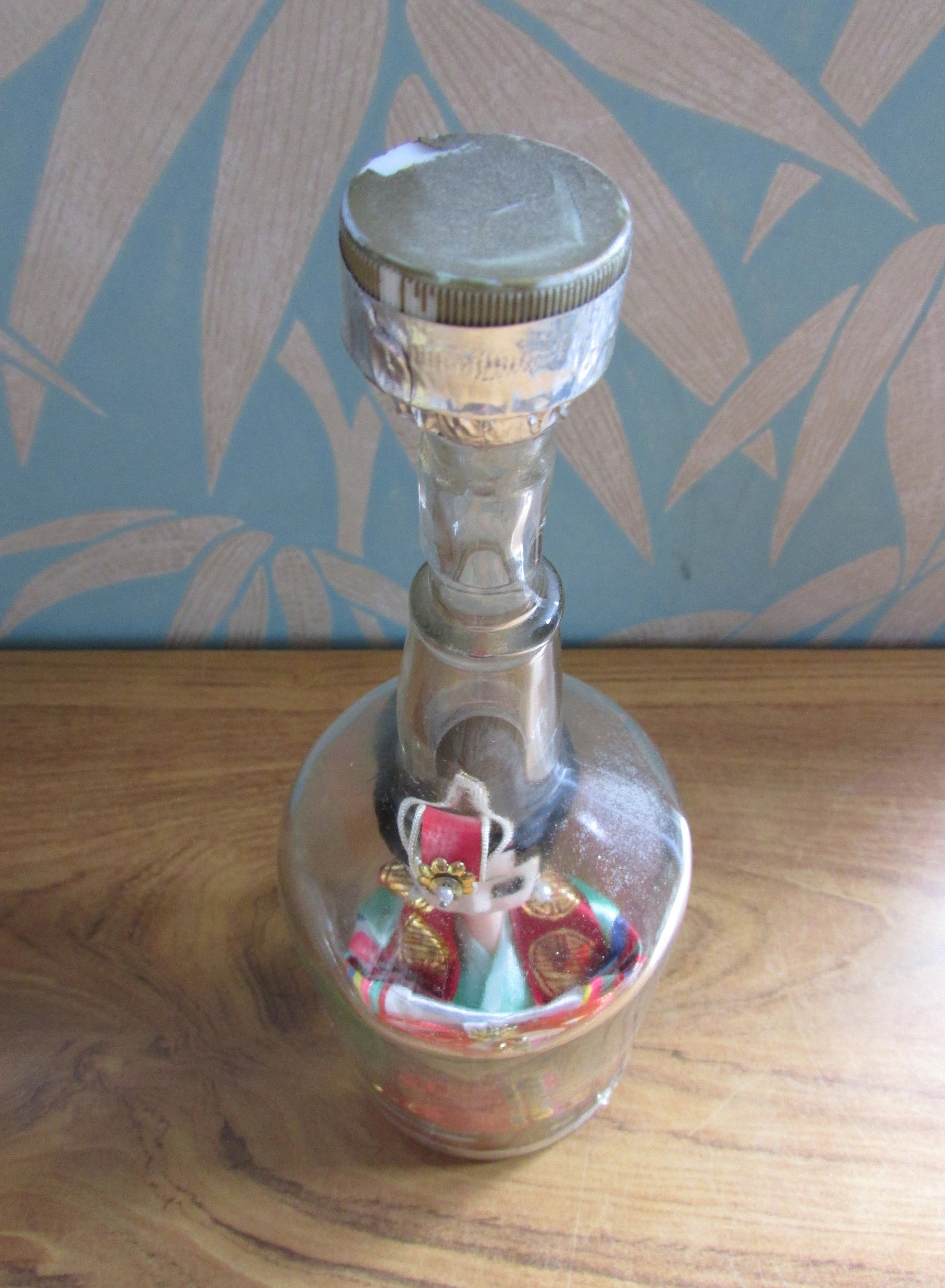 Quirky 'bottled' vintage Korean souvenir doll in traditional bridal dress
