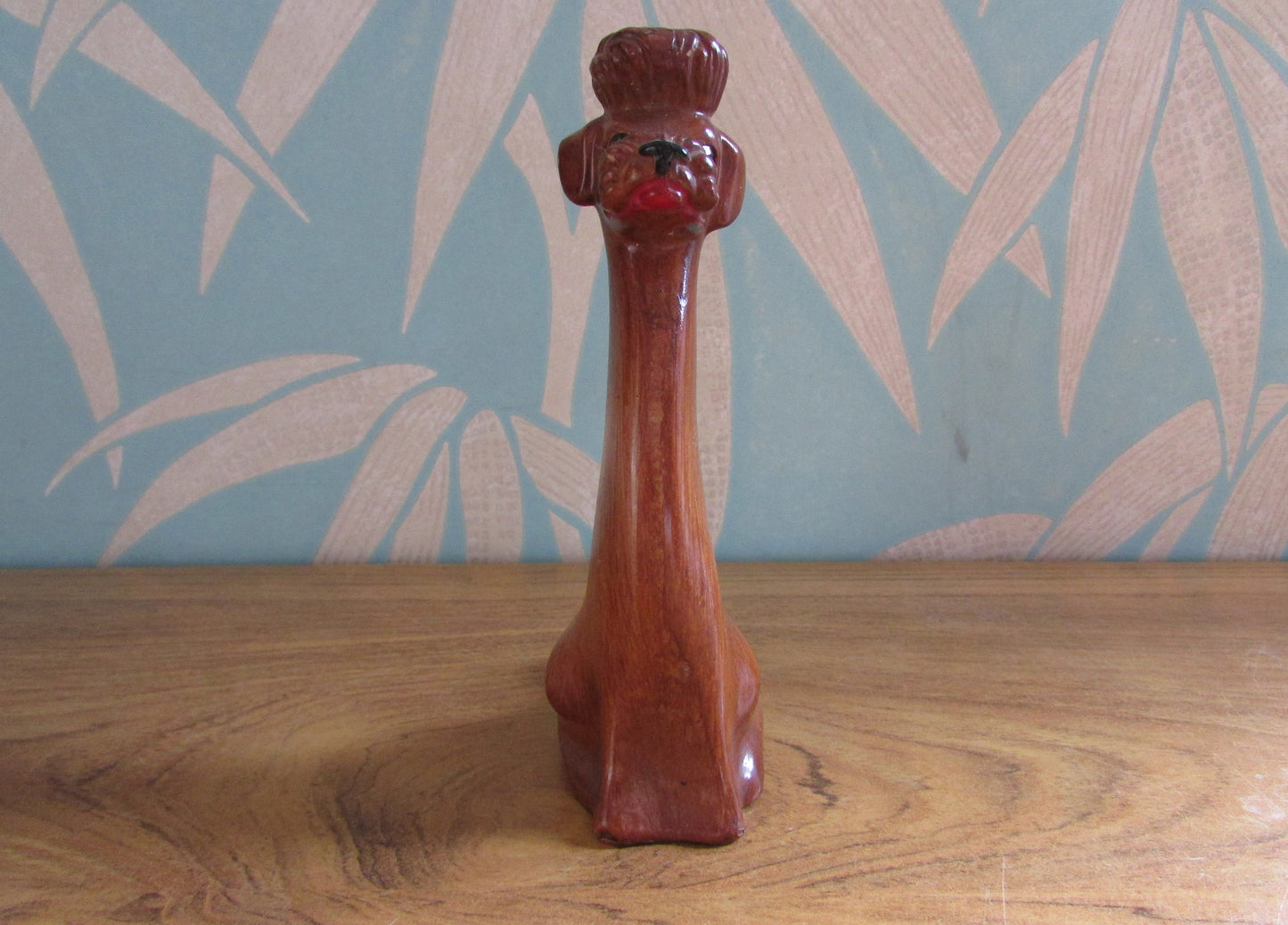 Vintage wood-effect poodle figurine with rhinestone eye detail, made in Italy