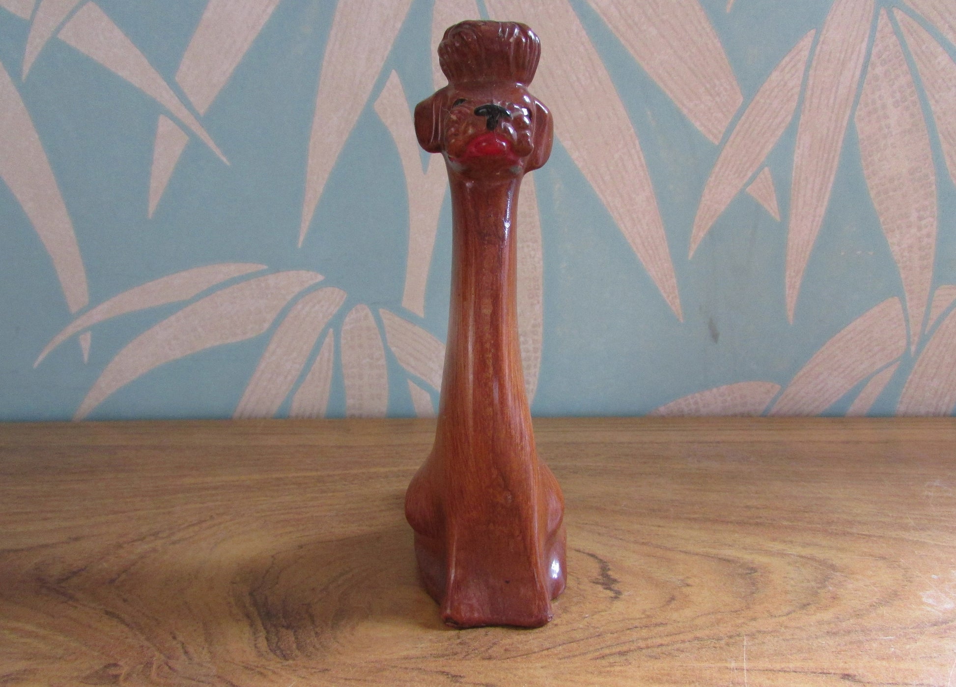 Vintage wood-effect poodle figurine with rhinestone eye detail, made in Italy