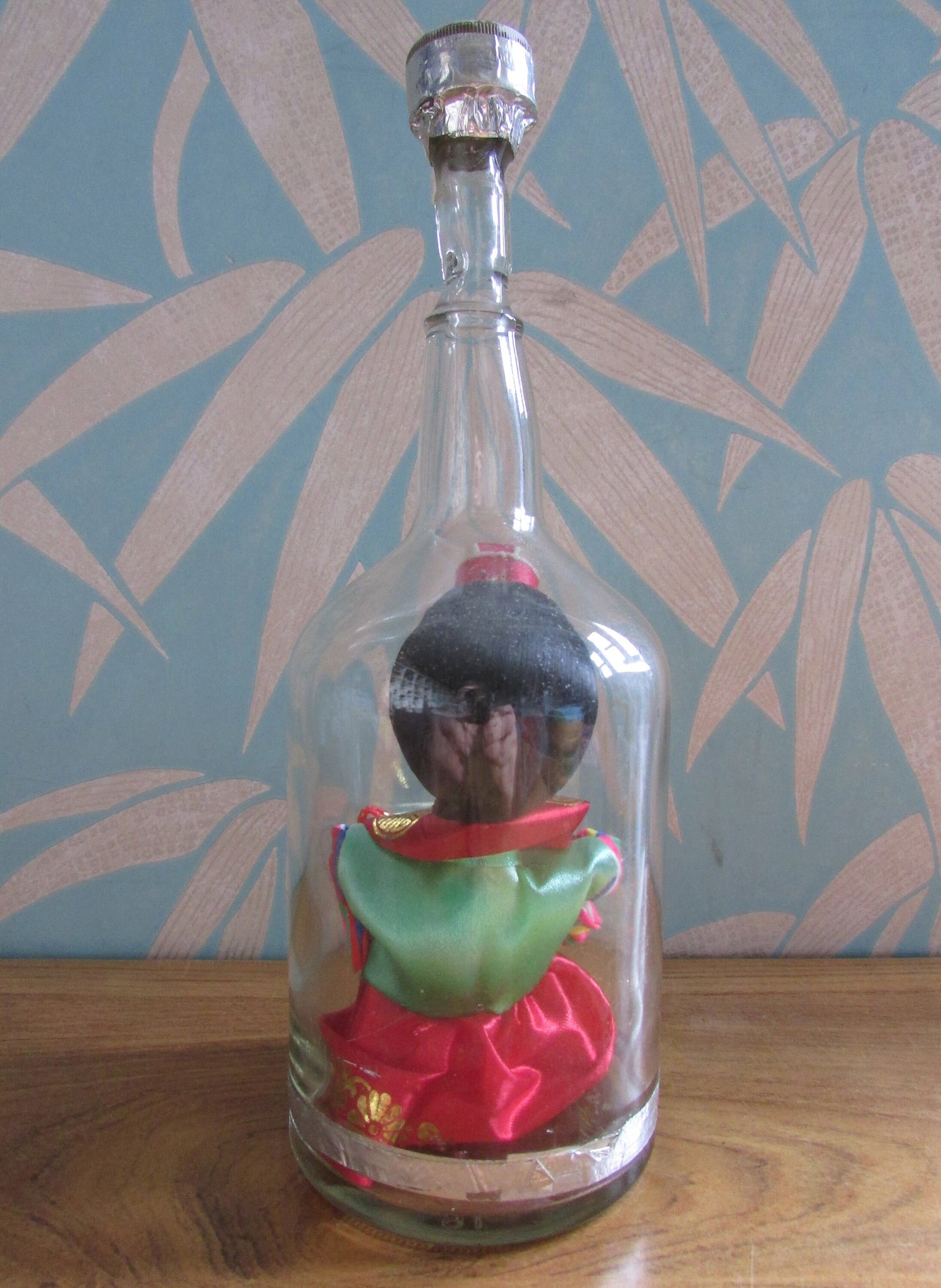 Quirky 'bottled' vintage Korean souvenir doll in traditional bridal dress
