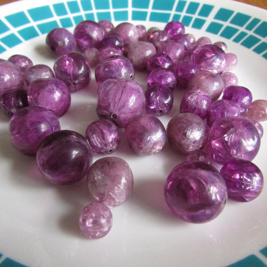 53 assorted vintage pearlescent purple marbled round plastic beads
