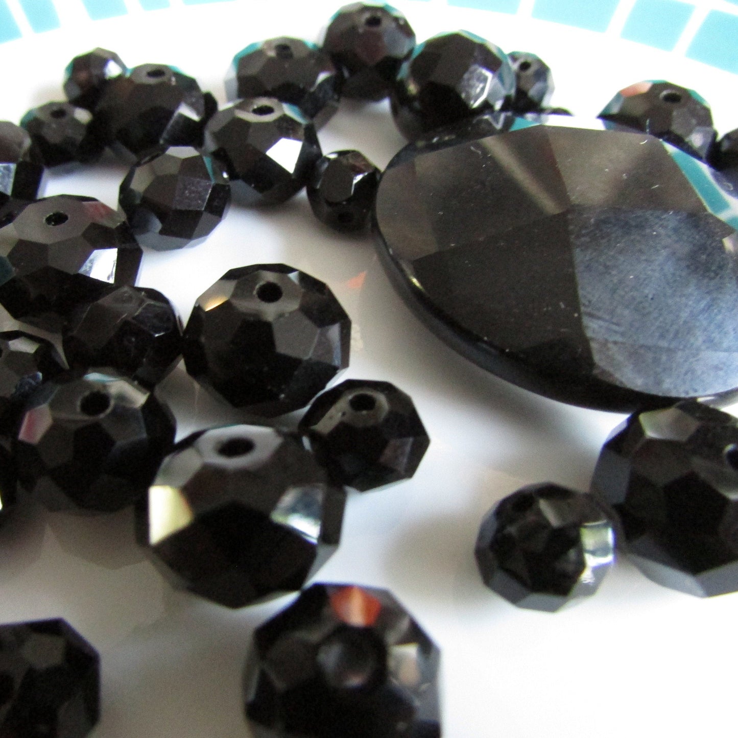 35 vintage black faceted glass beads, assorted shapes