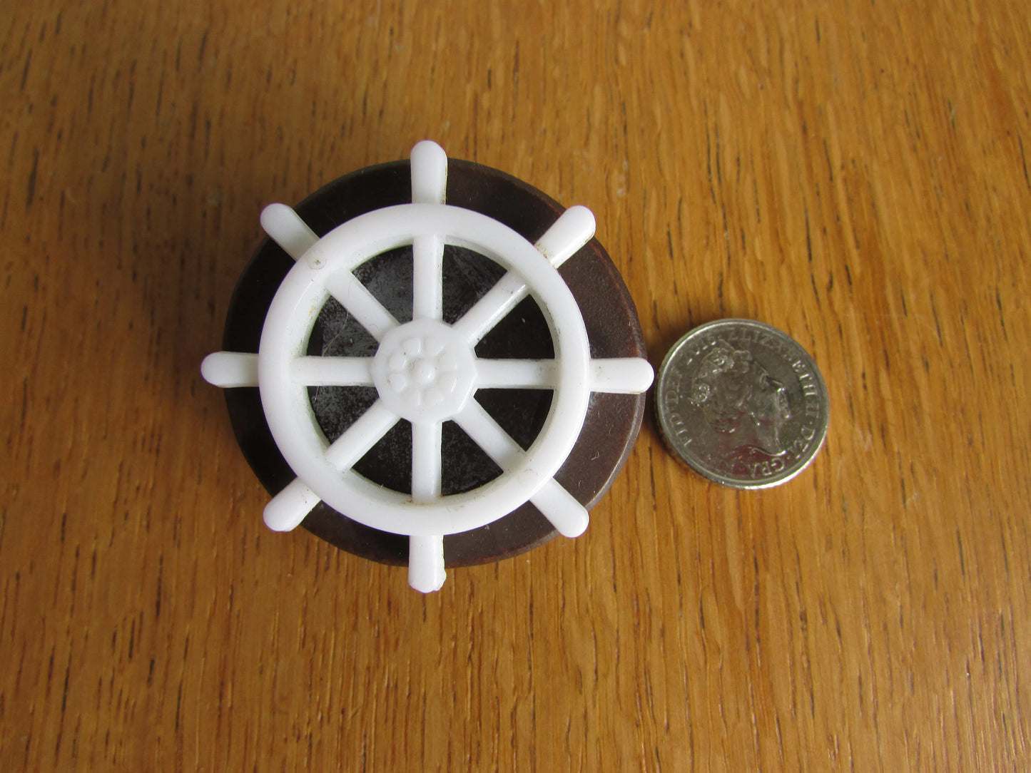 Home-made brooch using vintage plastic ships wheel and vintage wooden round bead