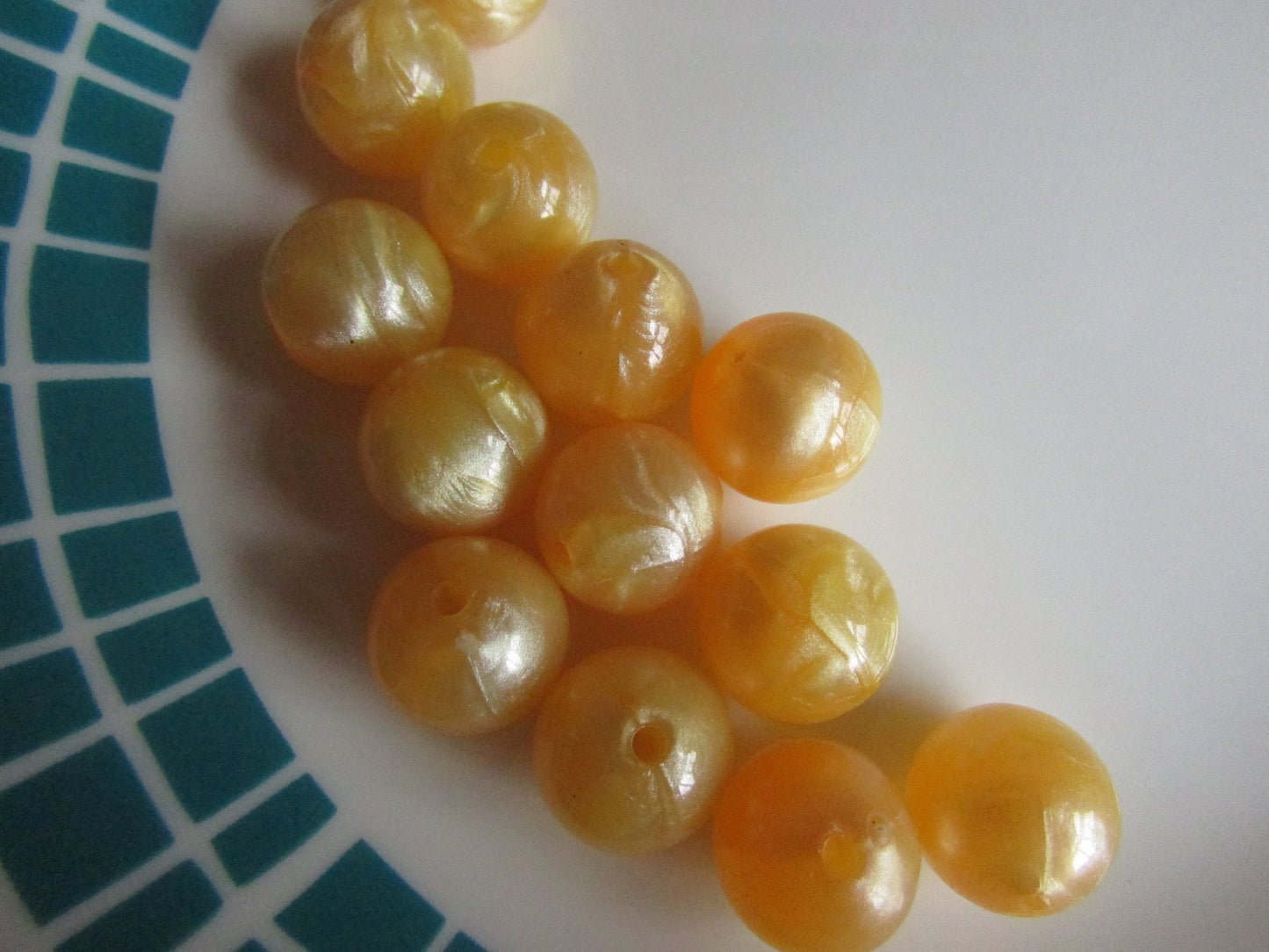13 vintage pearlescent lemon yellow/orange round plastic beads