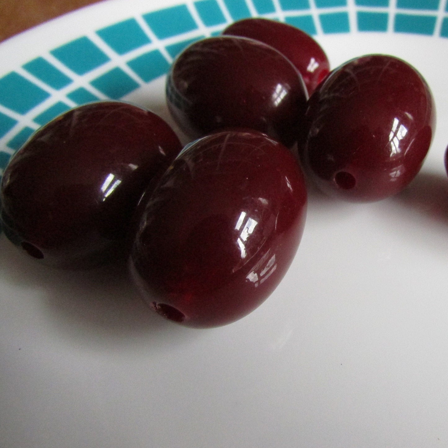 6 vintage large dark wine-coloured plastic olive-shaped beads