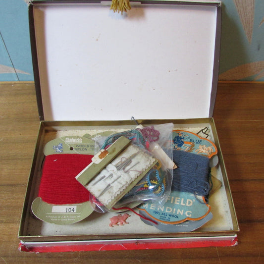 Assorted vintage sewing notions in vintage Terry's chocolate box