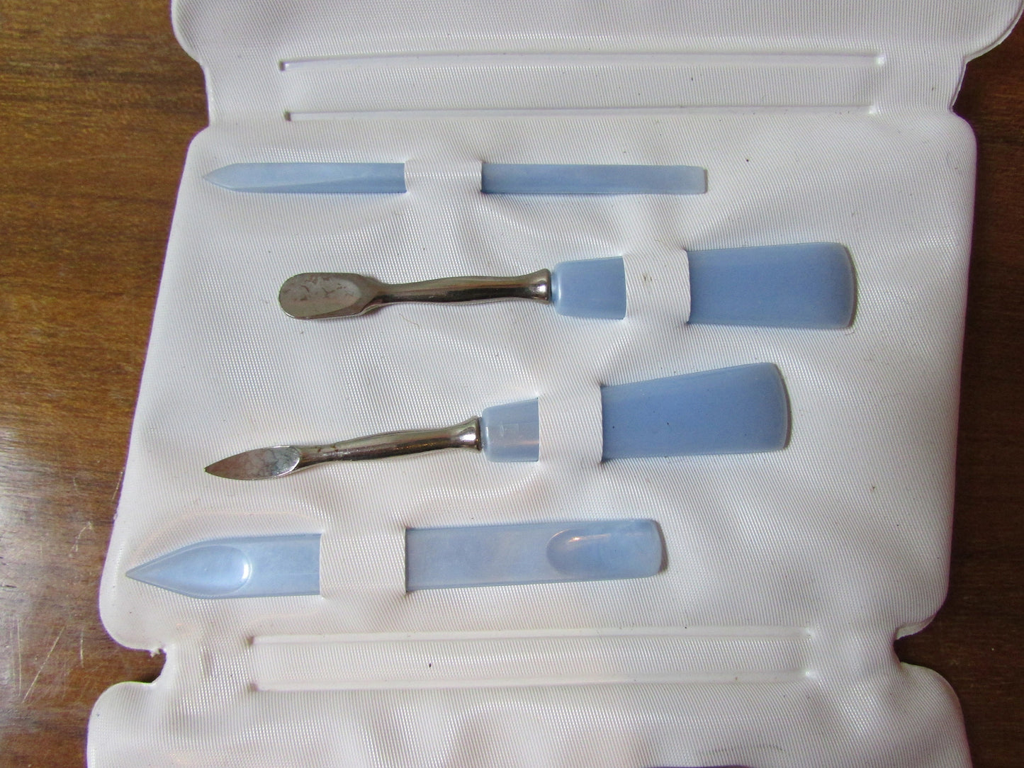 1960s manicure set in floral vinyl envelope