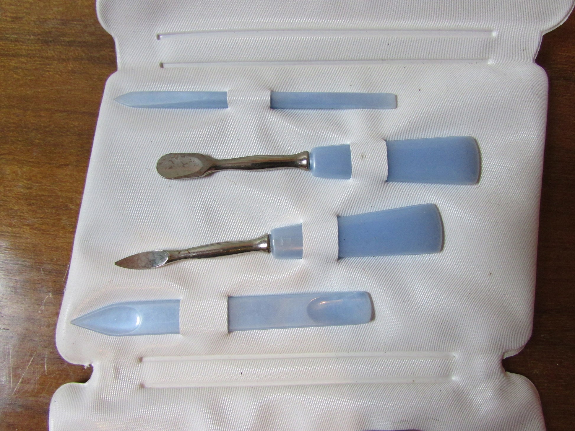 1960s manicure set in floral vinyl envelope
