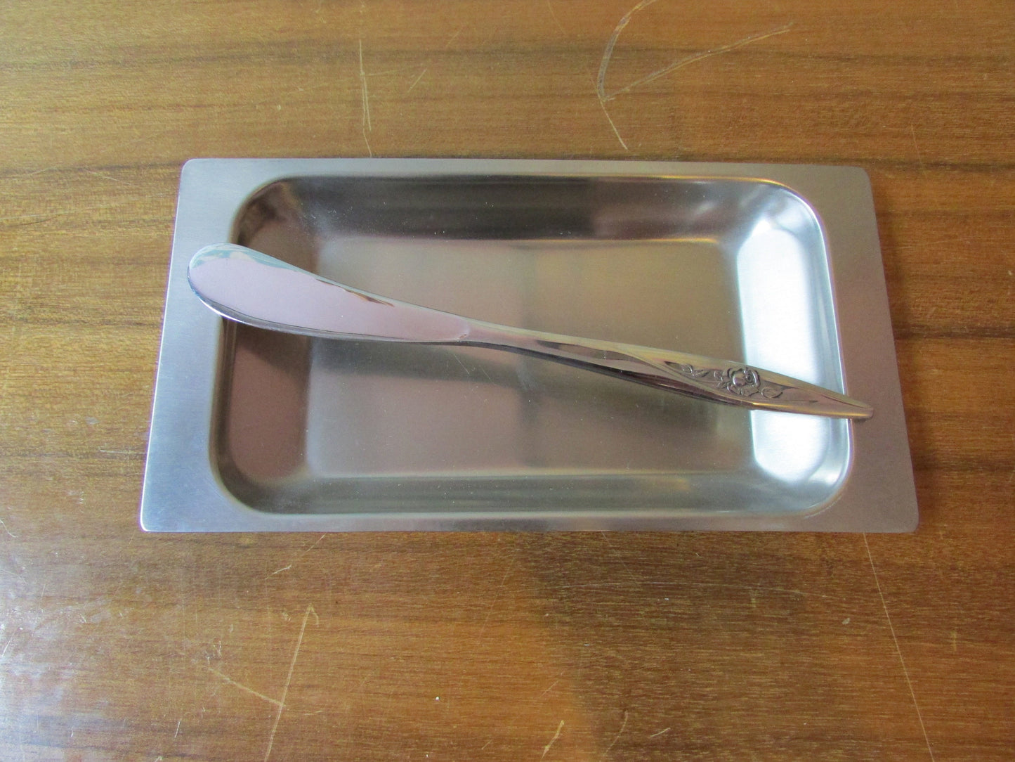 circa. 1960s Oneidacraft stainless steel 2-piece butter dish & knife set