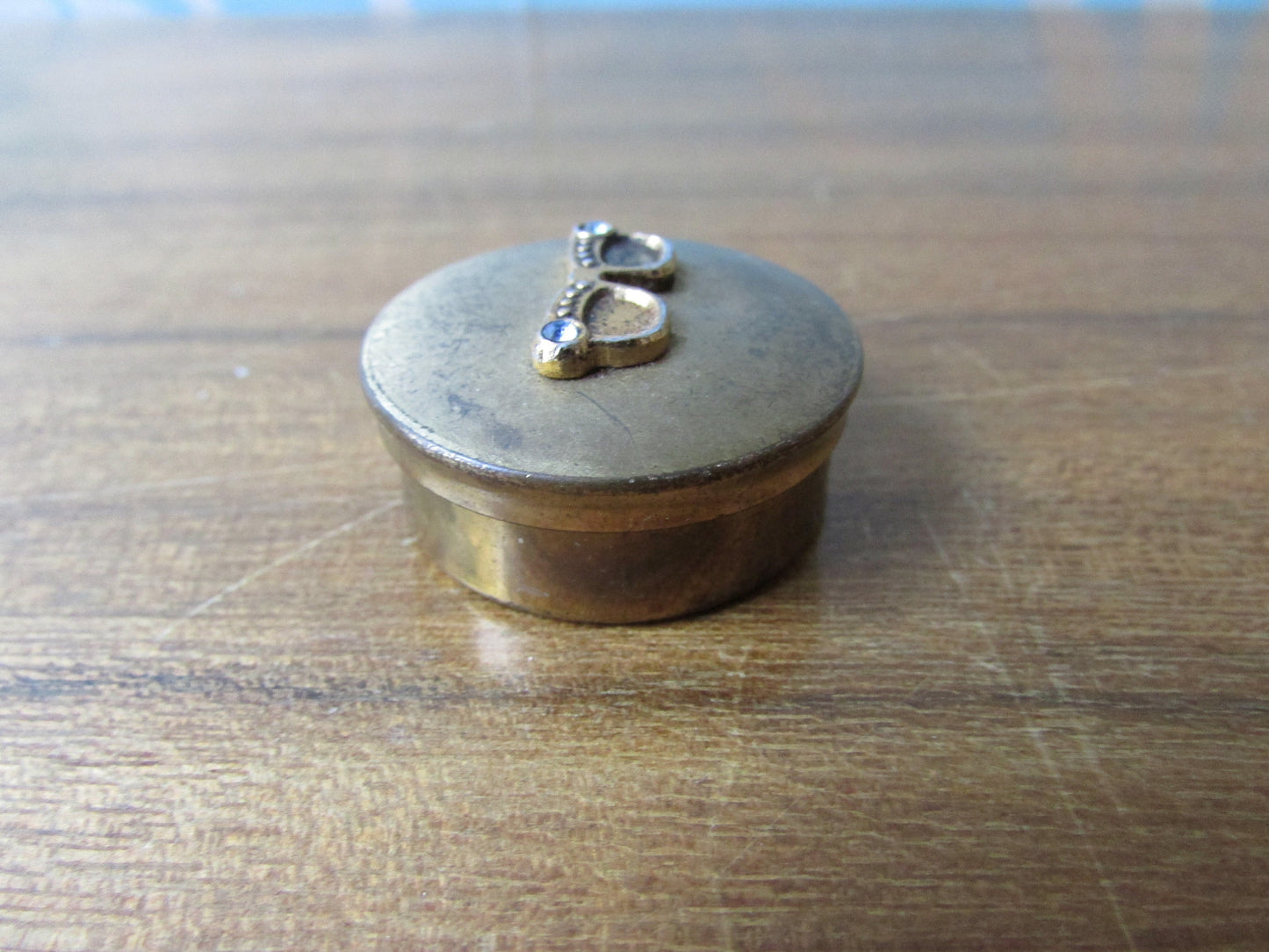 Small vintage brass-tone pill box, cute diamanté specs details