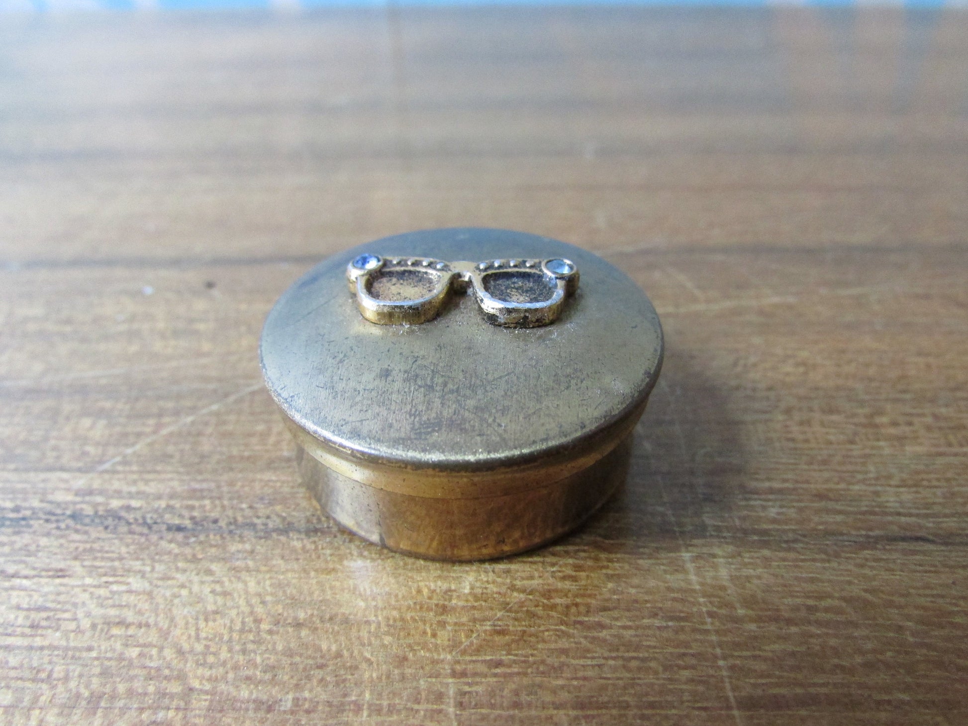 Small vintage brass-tone pill box, cute diamanté specs details