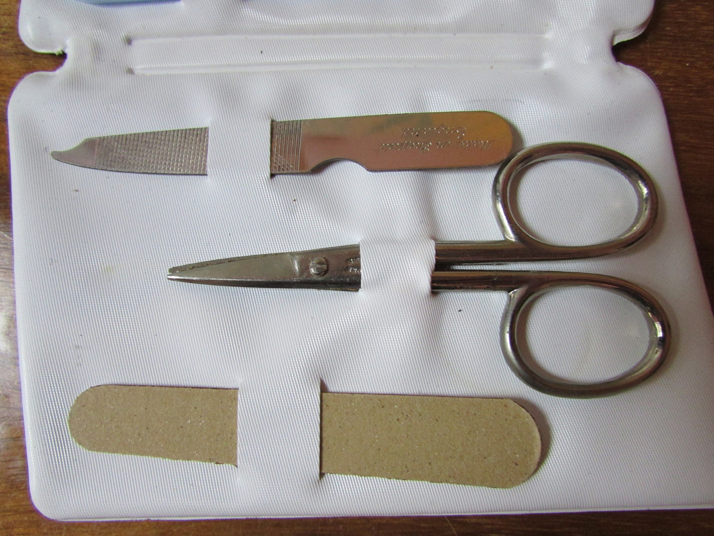 1960s manicure set in floral vinyl envelope