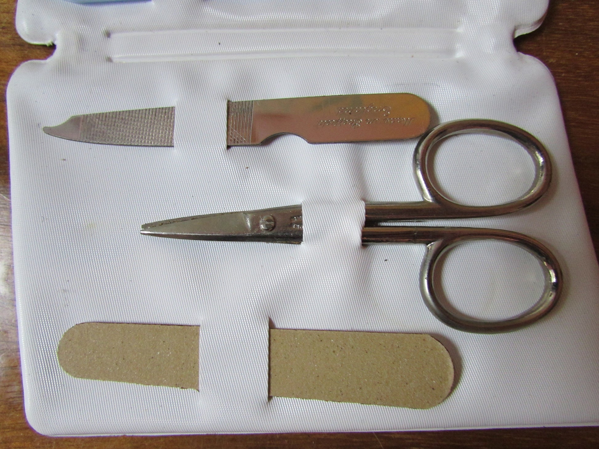 1960s manicure set in floral vinyl envelope