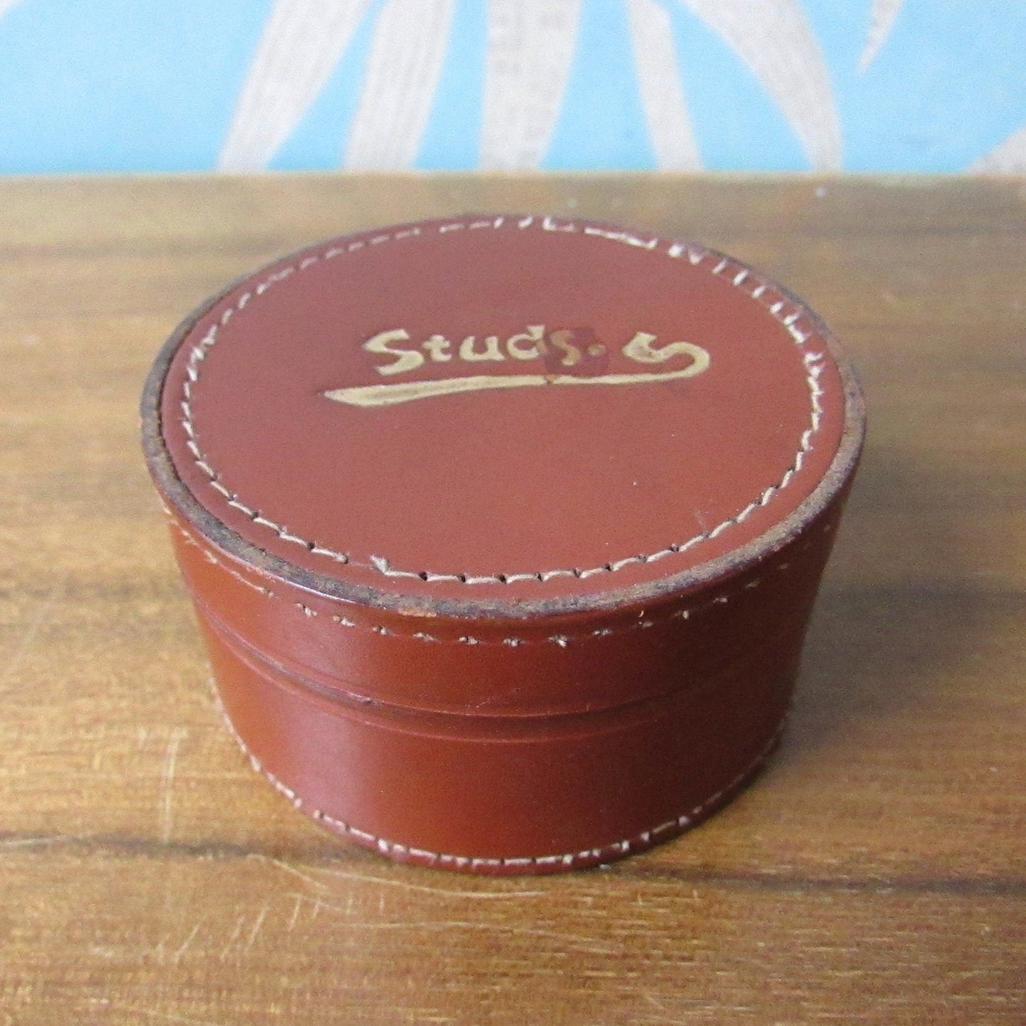 Vintage round brown leather "Studs" box, made in England
