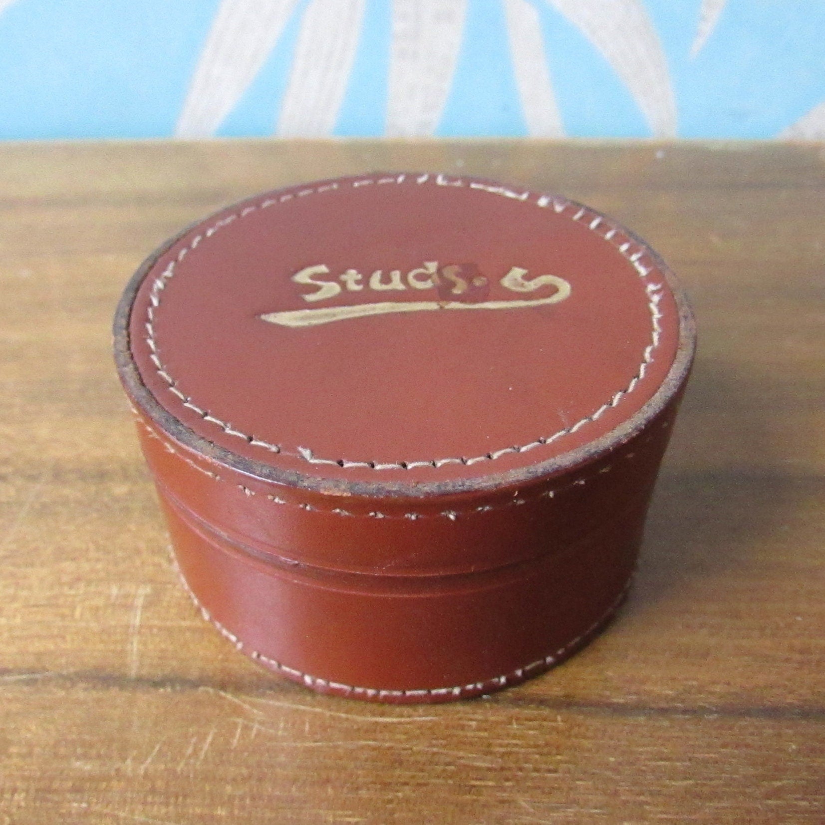 Vintage round brown leather "Studs" box, made in England