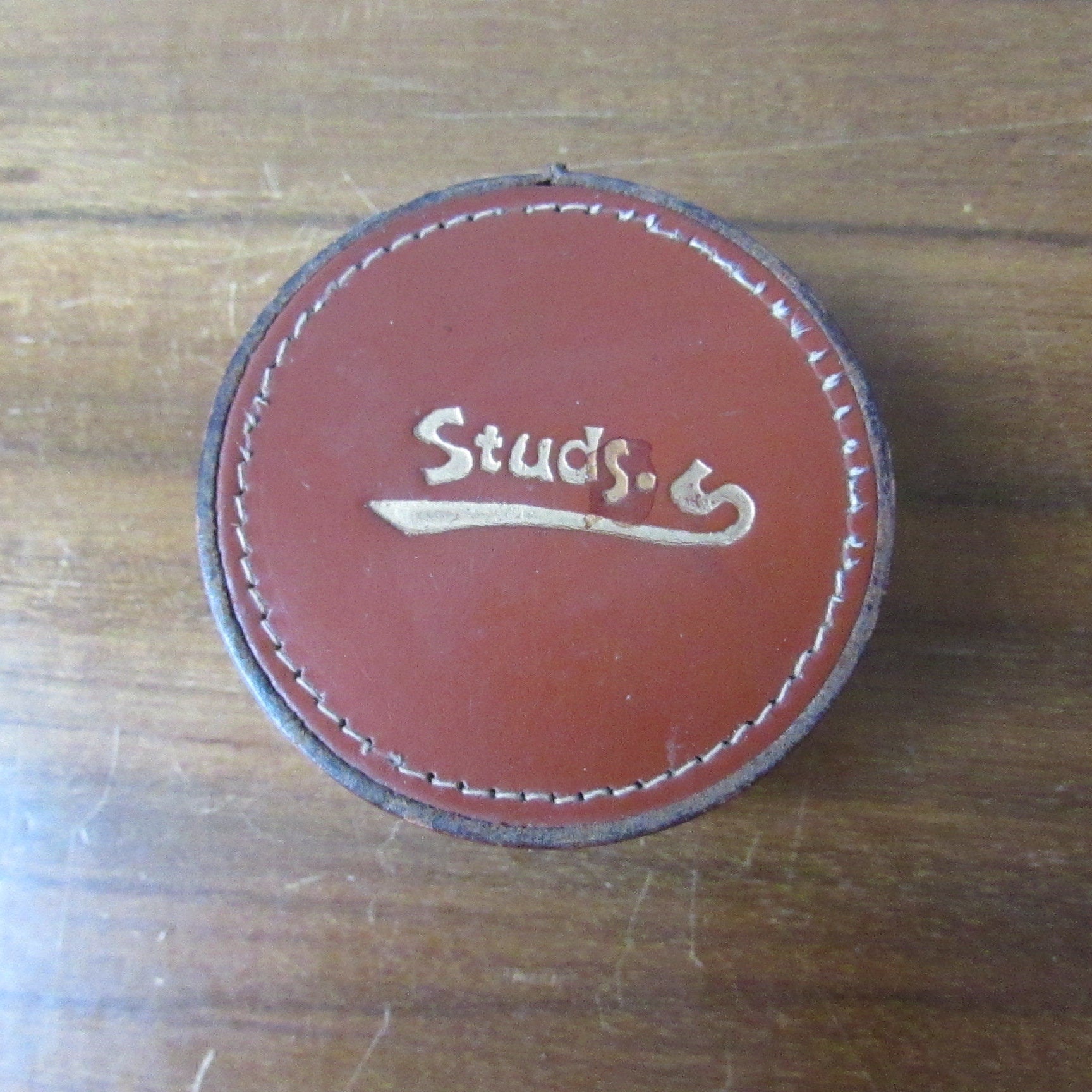 Vintage round brown leather "Studs" box, made in England