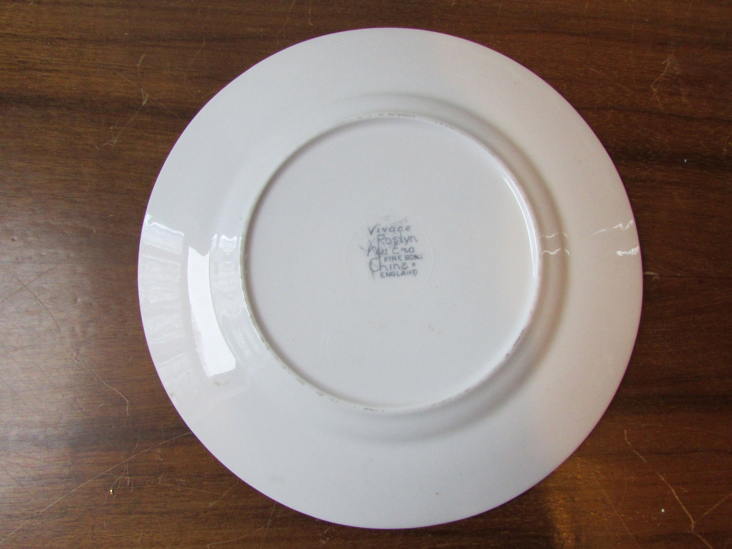 Four 1950s Vivace Roslyn hu-Era bone china side plates