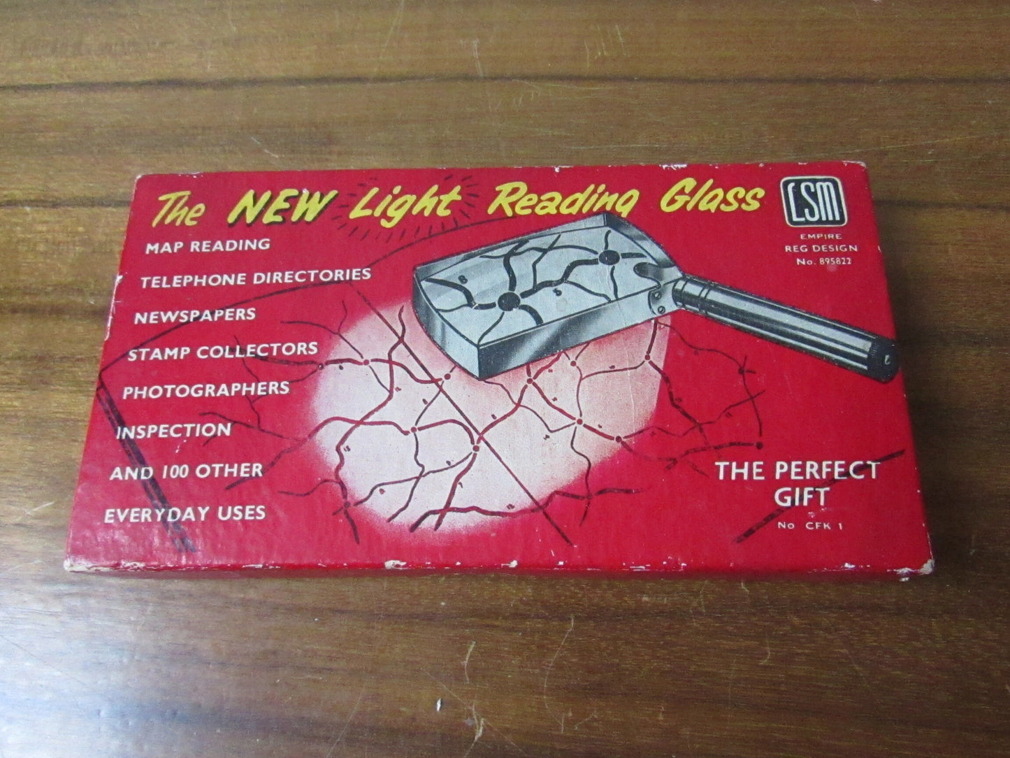 Vintage LSM light reading glass with original packaging