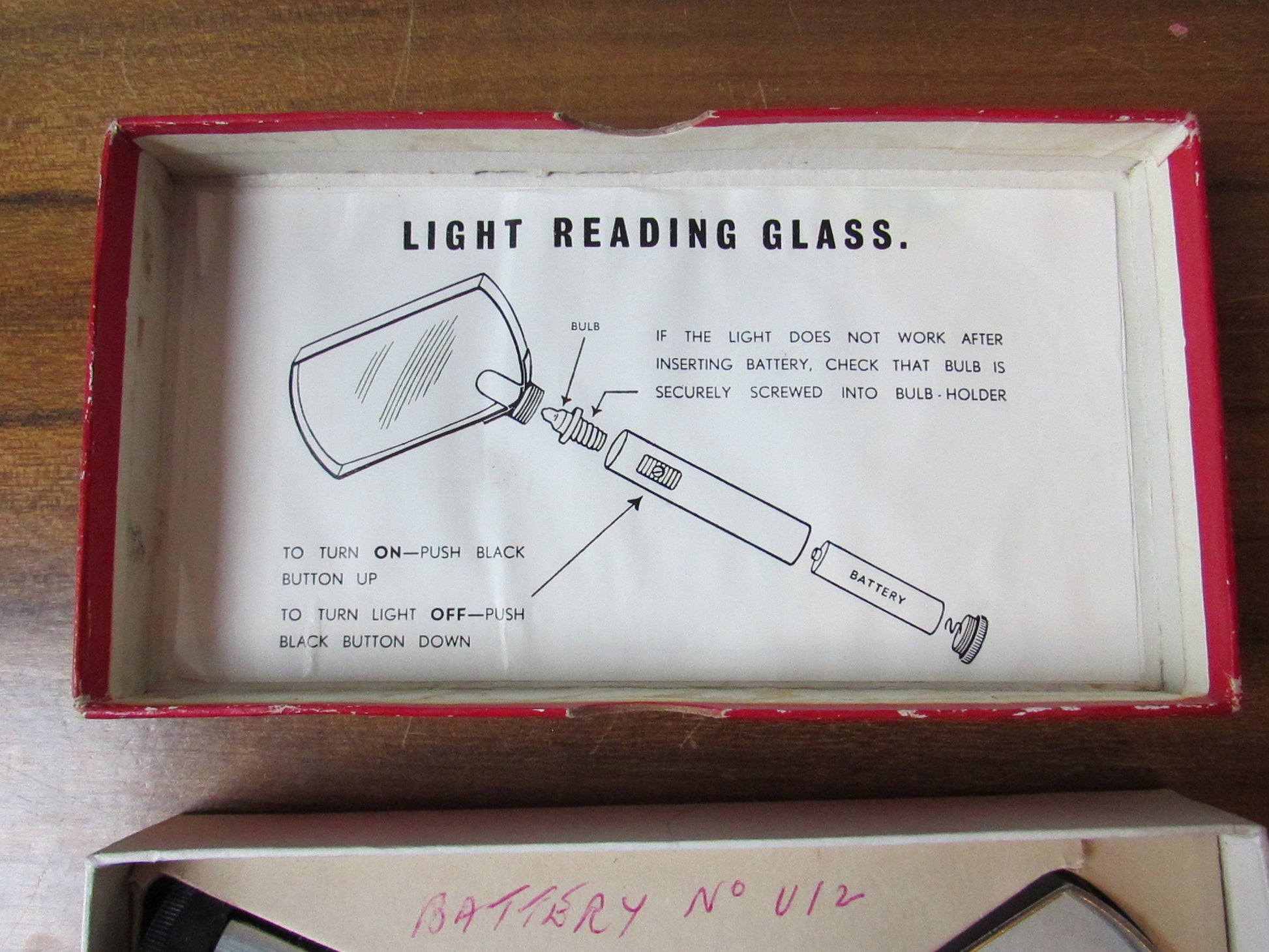 Vintage LSM light reading glass with original packaging