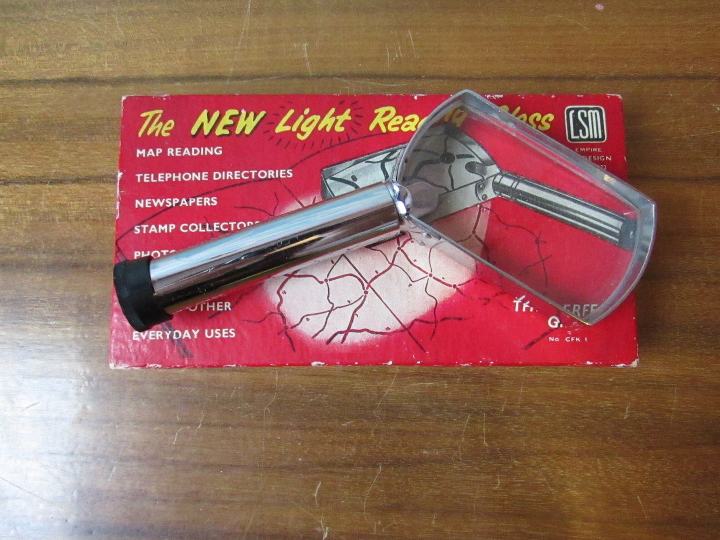 Vintage LSM light reading glass with original packaging