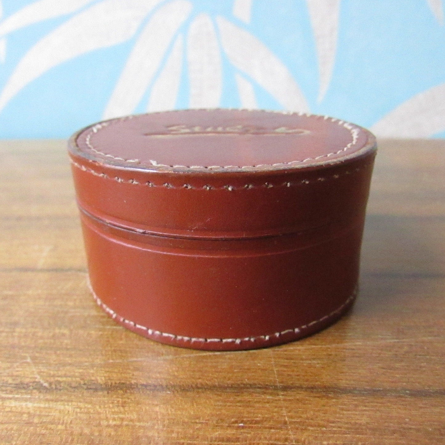 Vintage round brown leather "Studs" box, made in England