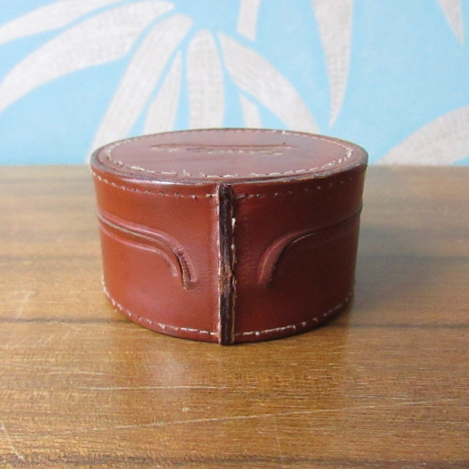Vintage round brown leather "Studs" box, made in England