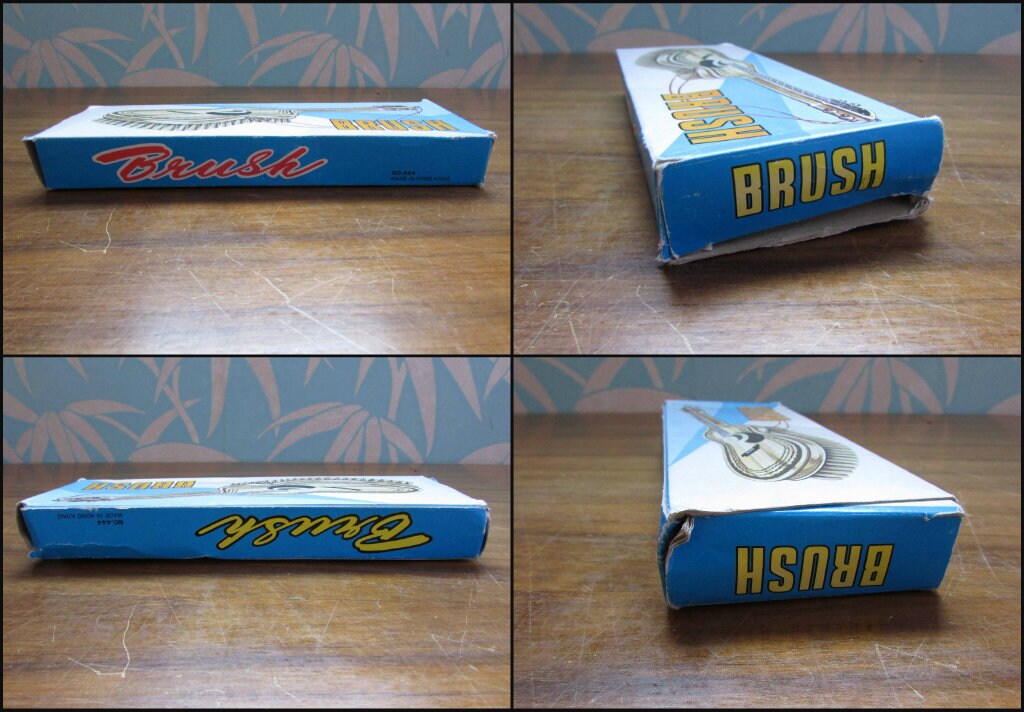 1970s/80s "I Love Malta" plastic guitar-shaped clothes/hair brush