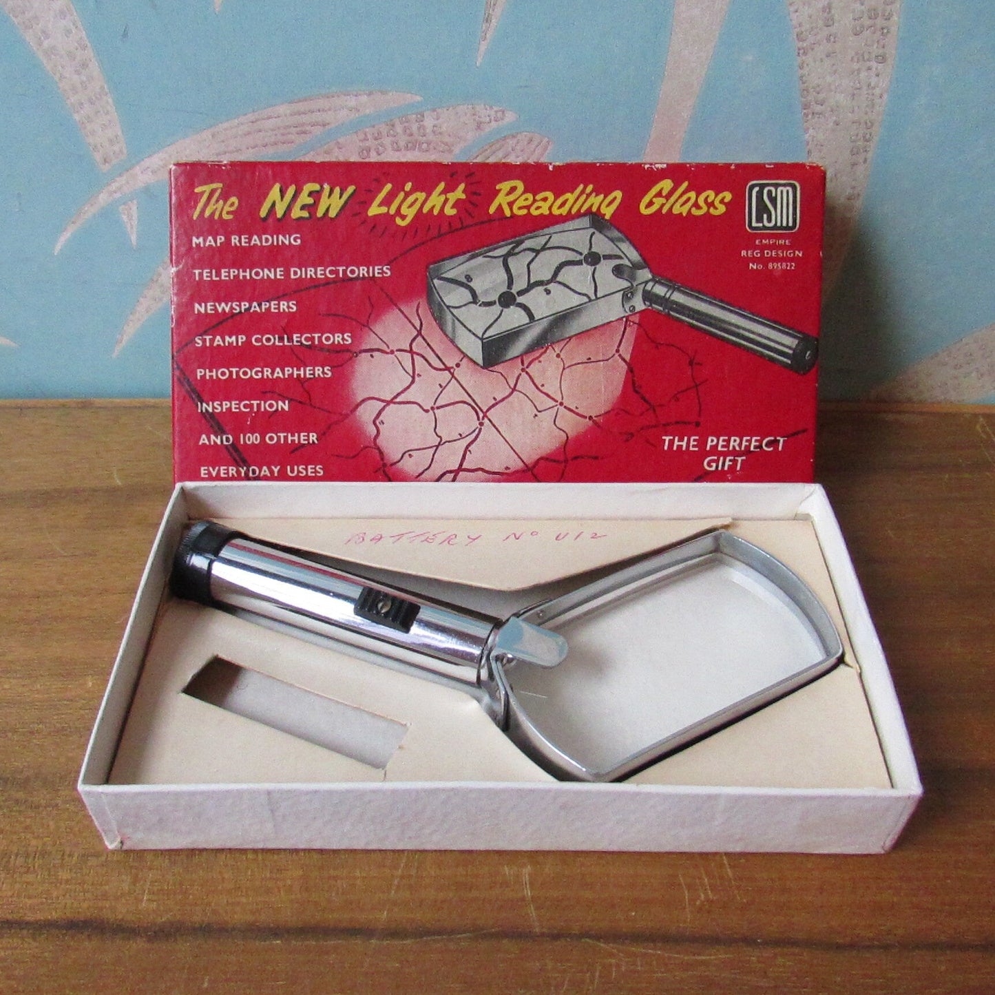 Vintage LSM light reading glass with original packaging